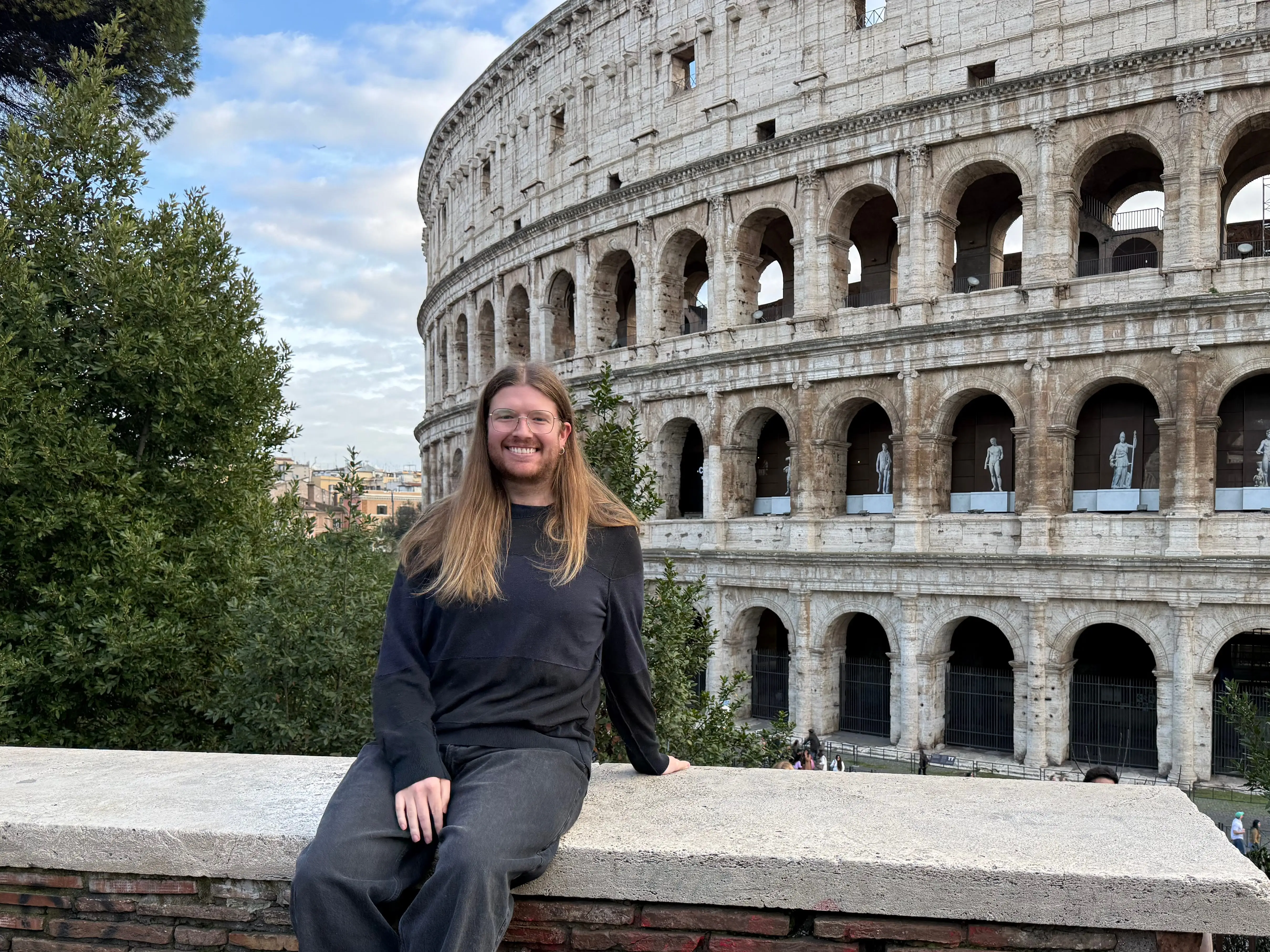 Harrison Pierce in front of the Colosseum in Rome