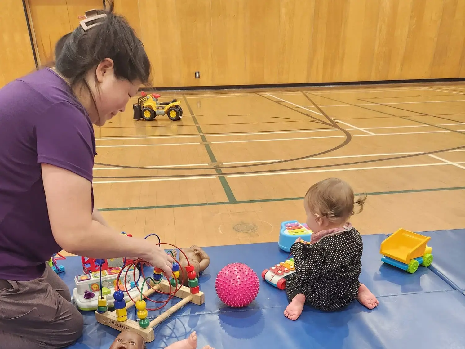 The author's mom with her daughter at the community center.