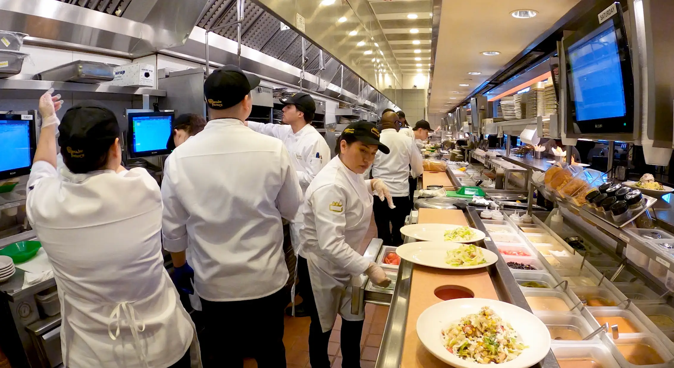 Behind the scenes look at a kitchen at The Cheesecake Factory.