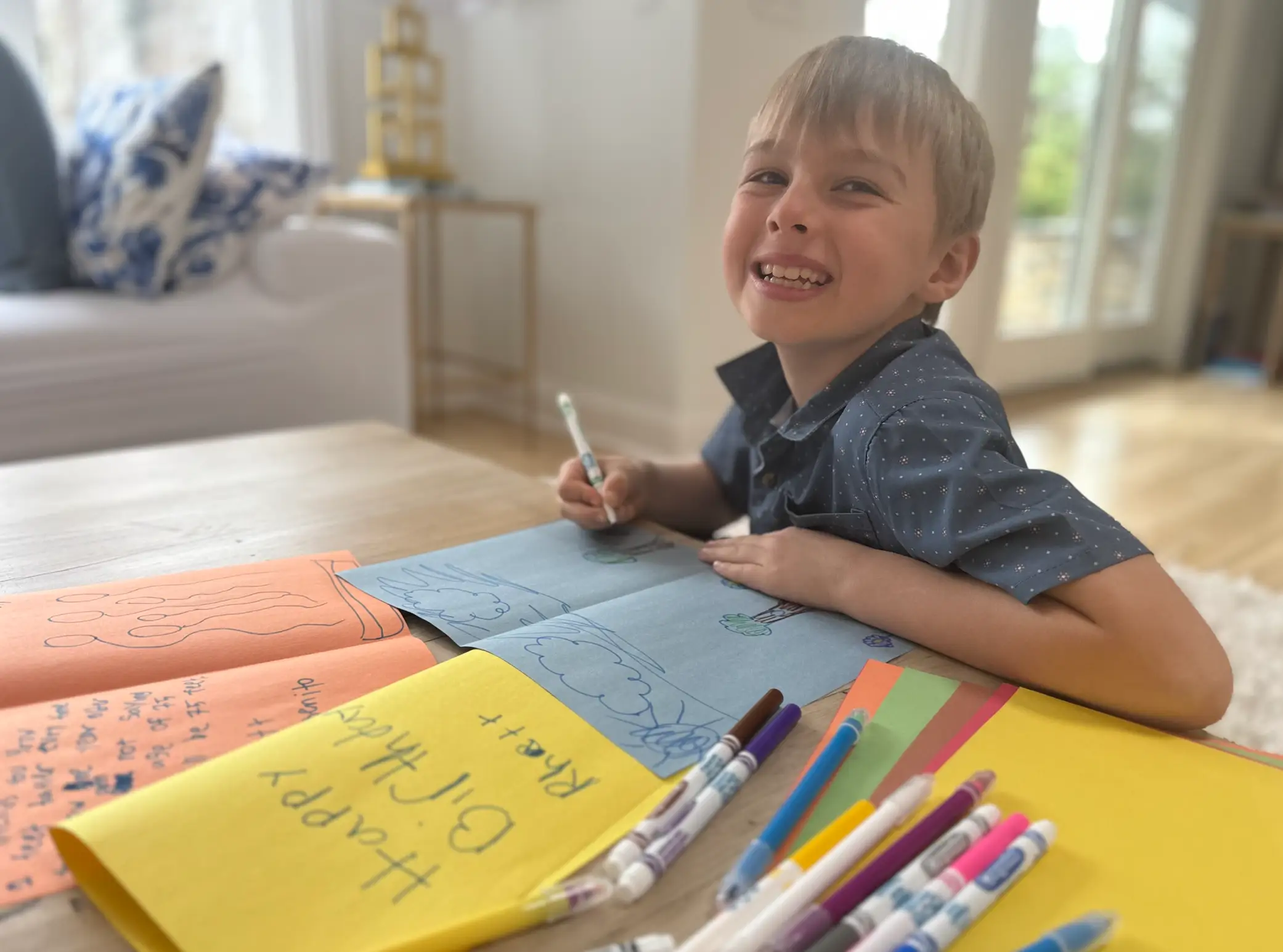 Boy writing cards