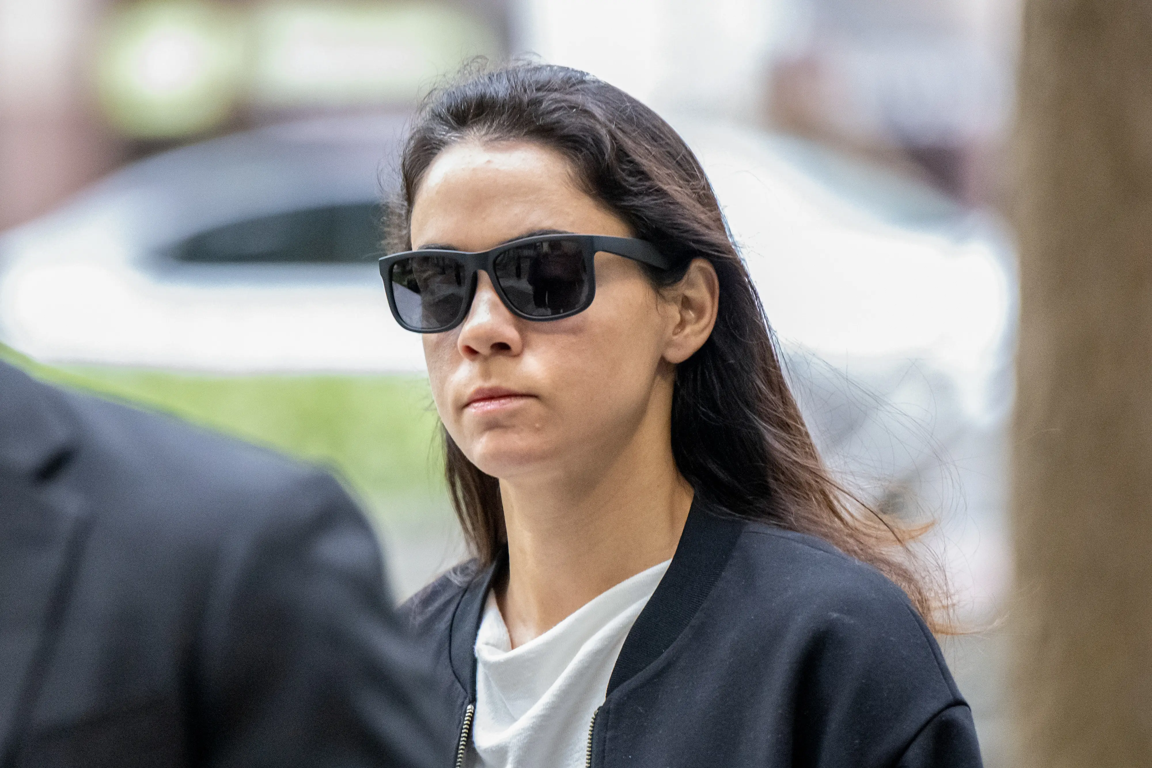 Shivon Zilis, former board member of OpenAI Inc., arrives at the federal court in Oakland, California, US, on Tuesday, May 5, 2026. Elon Musk is suing OpenAI and Microsoft Corp. over claims that the startup abandoned its founding mission when it took billions of dollars in backing from the software stalwart and planned its restructuring.