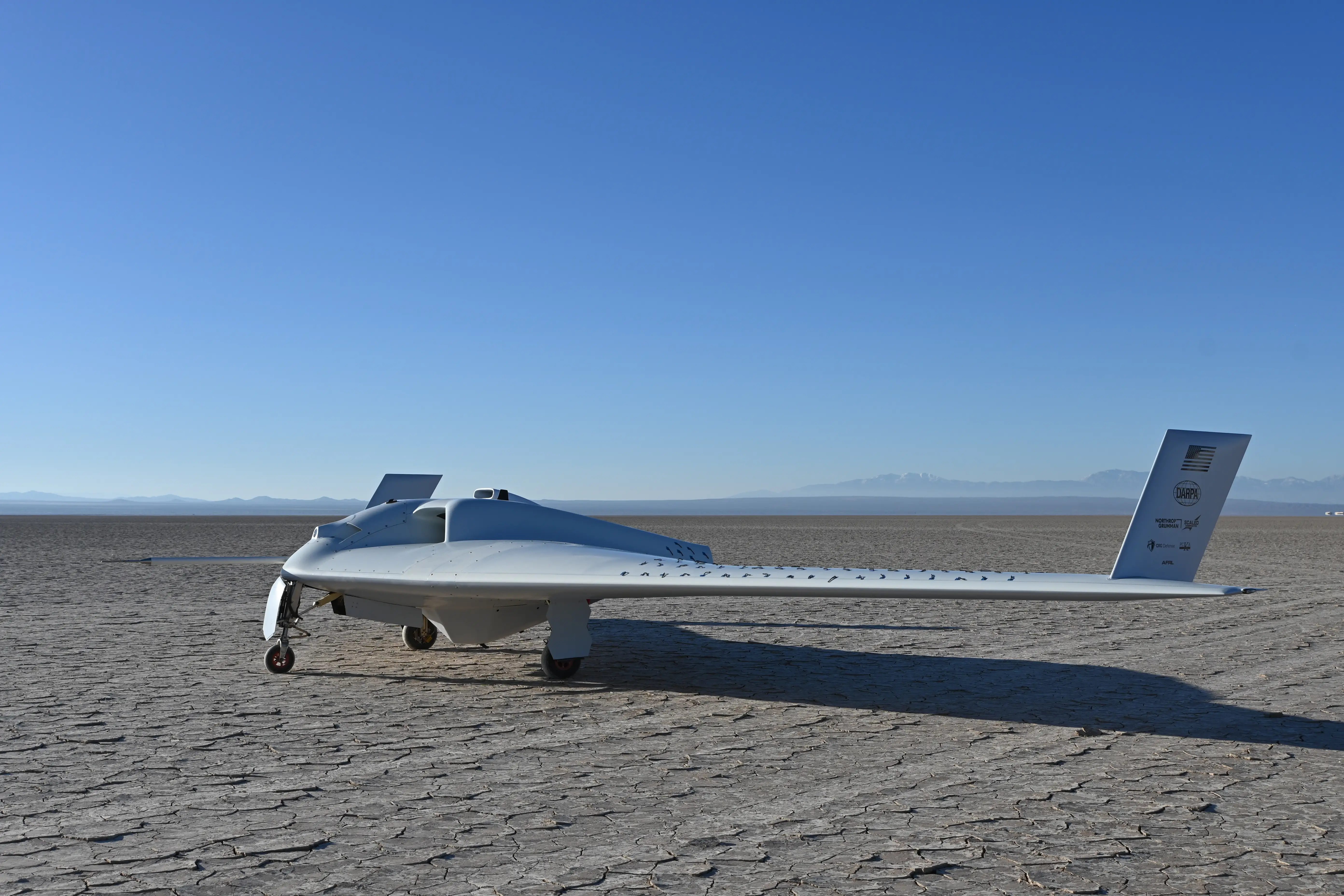 The XRQ-73 sits on the desert.