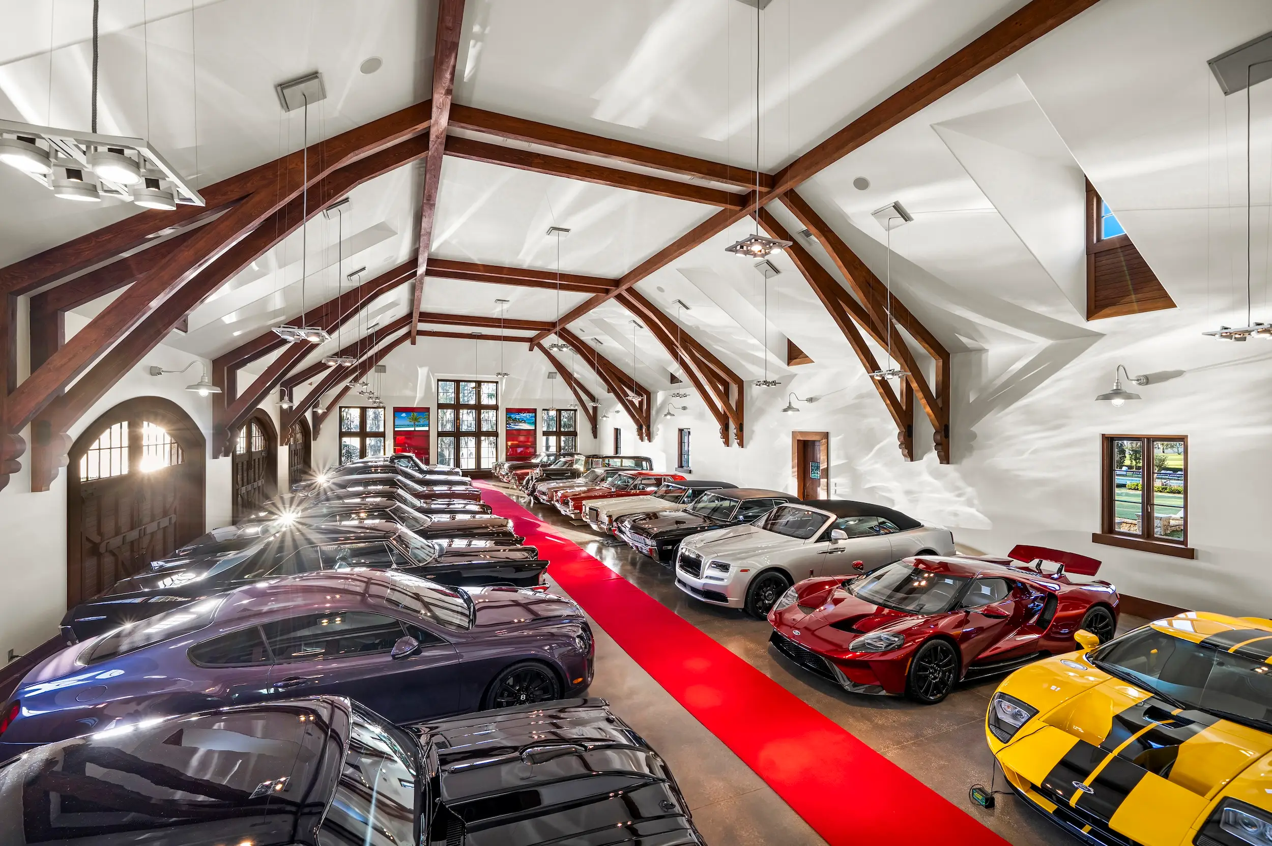 A car museum full of luxury cars.