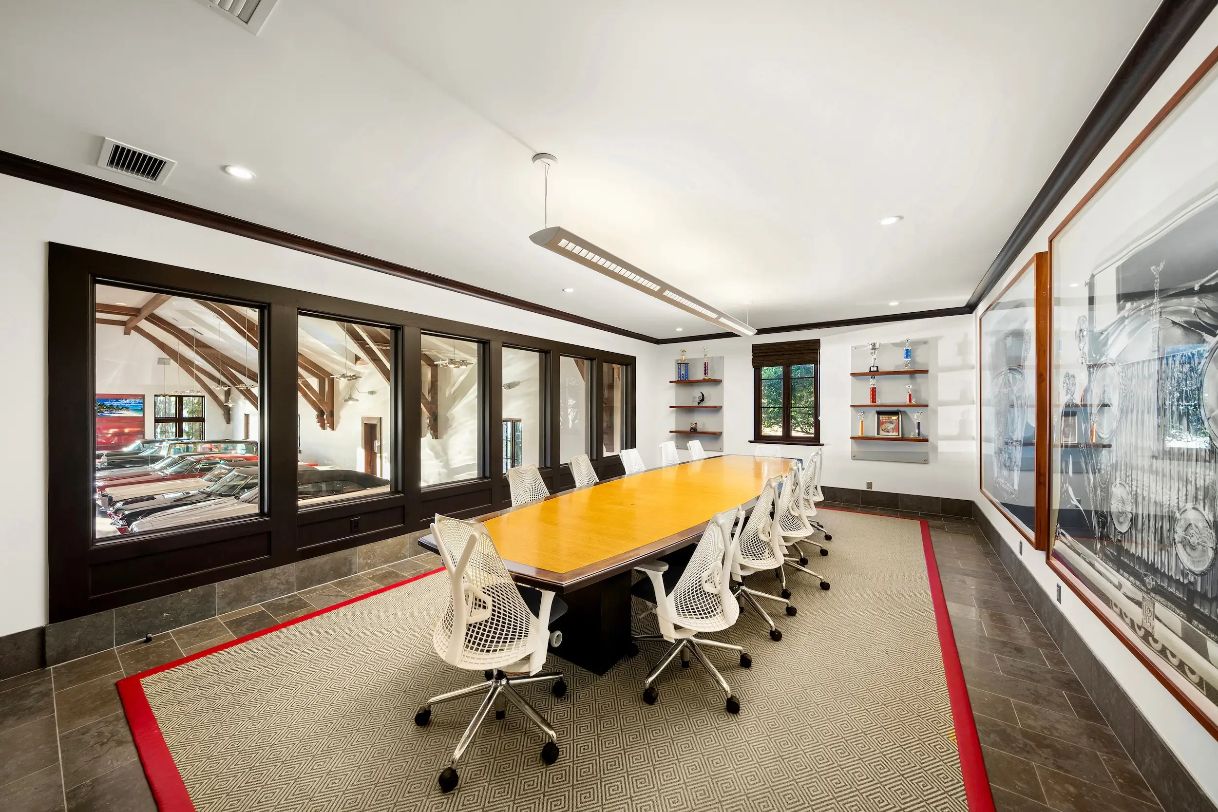 A long office table in a conference room.