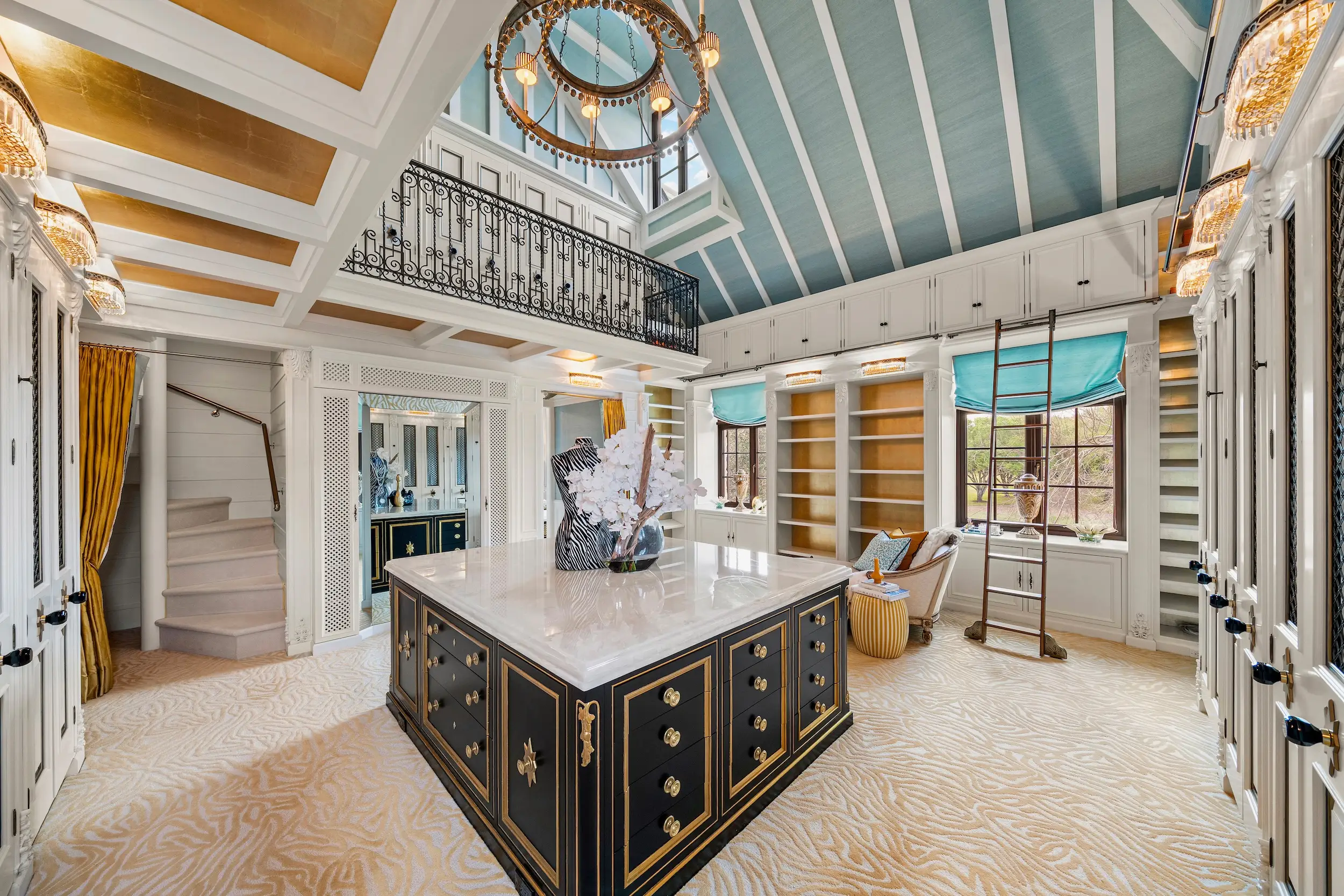A large two-story closet in a mansion.