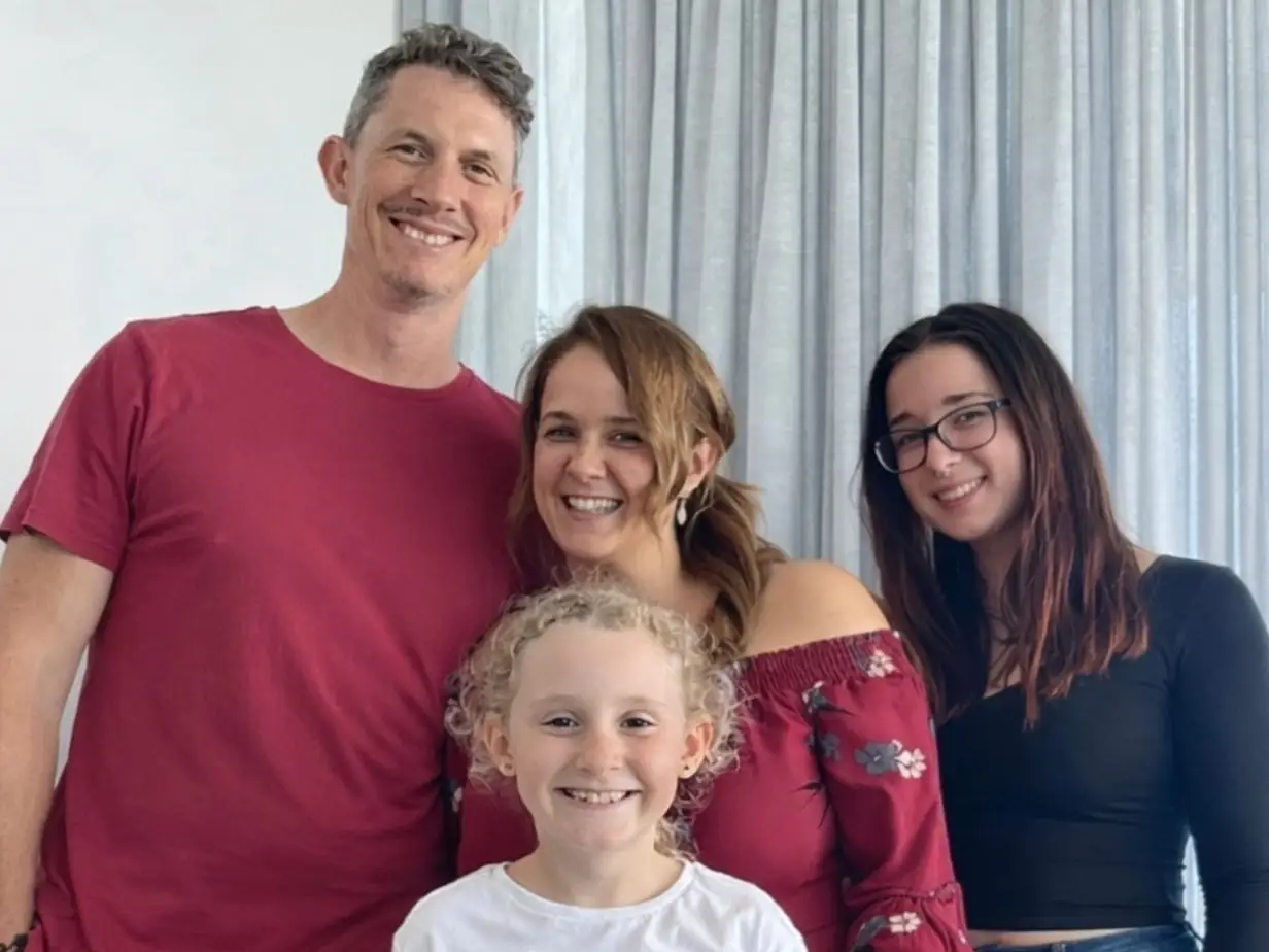 Family posing for photo
