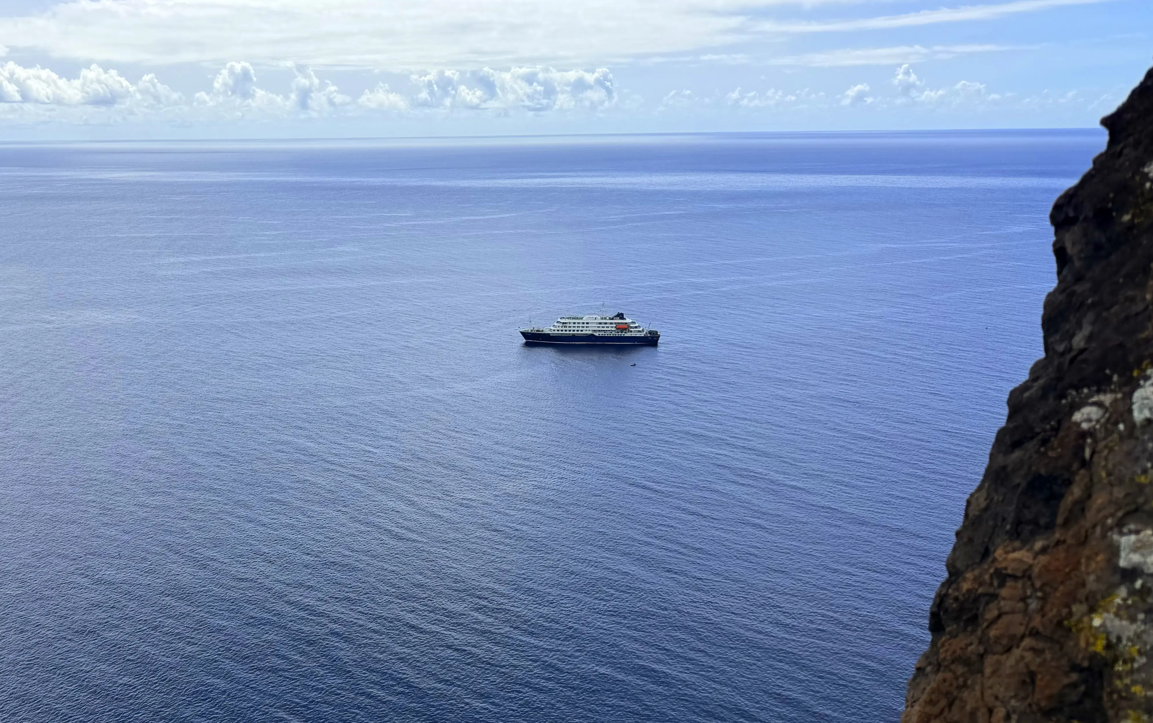 A ship in the middle of the ocean.
