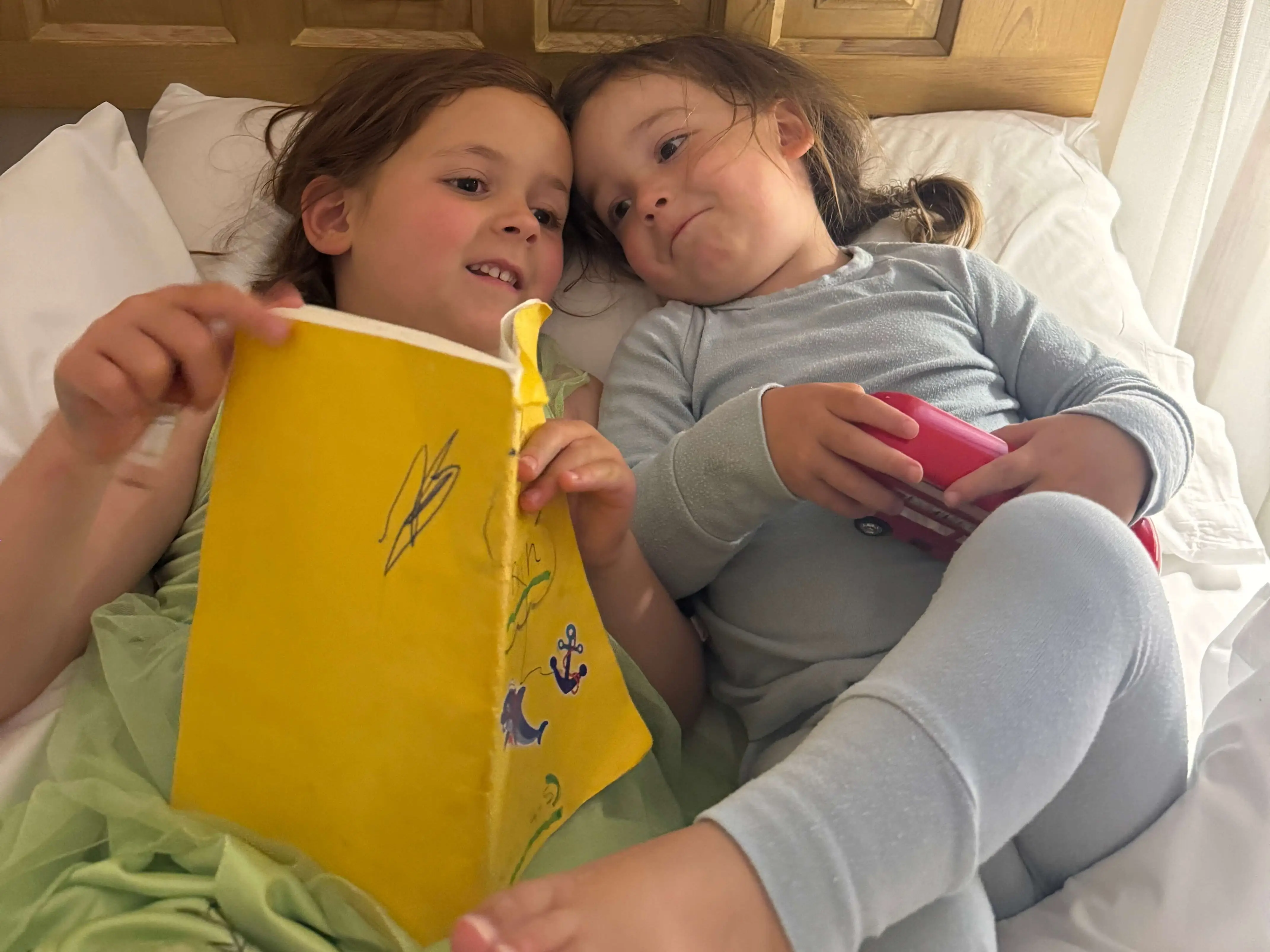 Kids in bed reading
