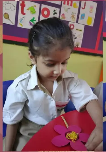 The author's daughter working on a craft project.