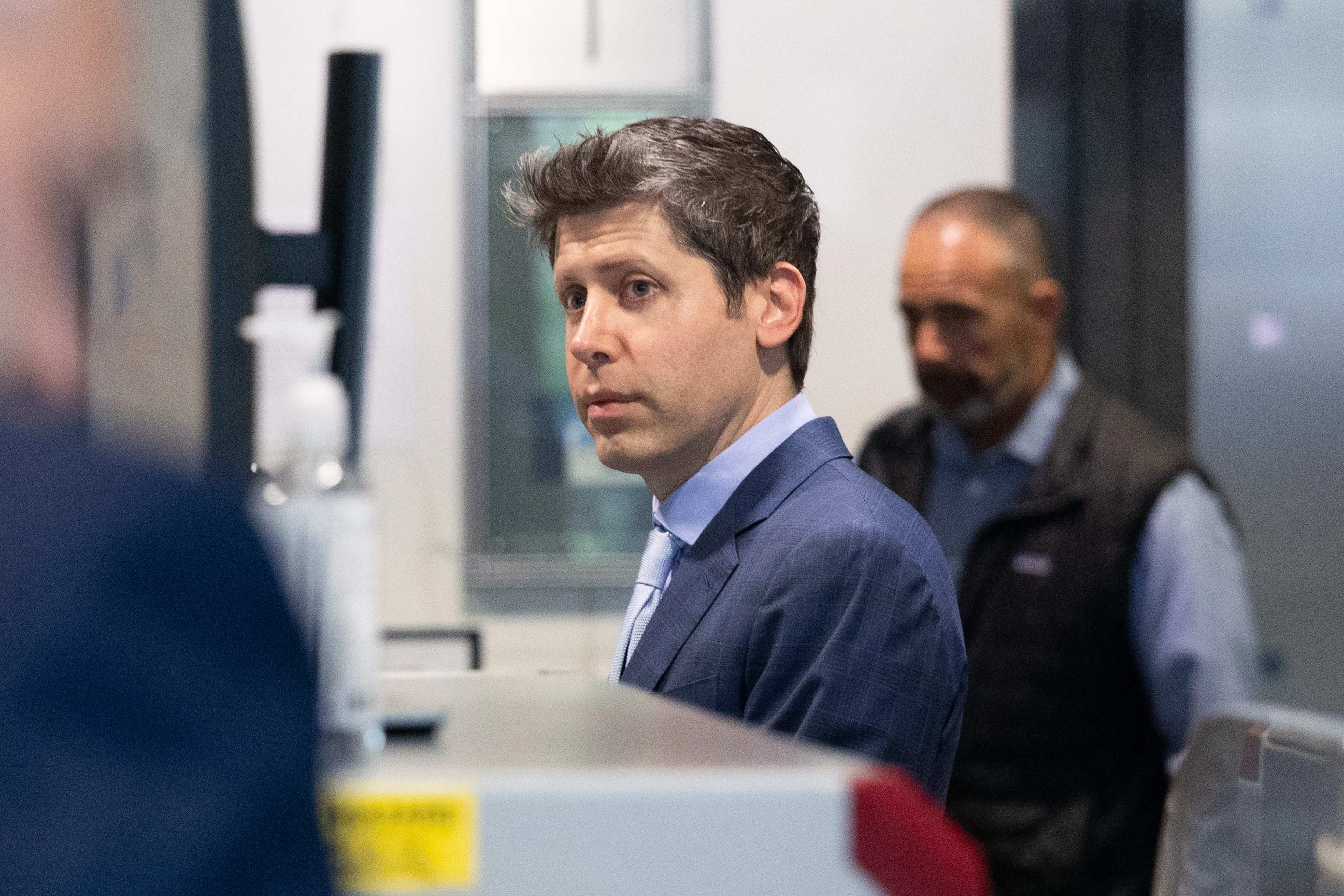 OpenAI CEO Sam Altman arrives at court.