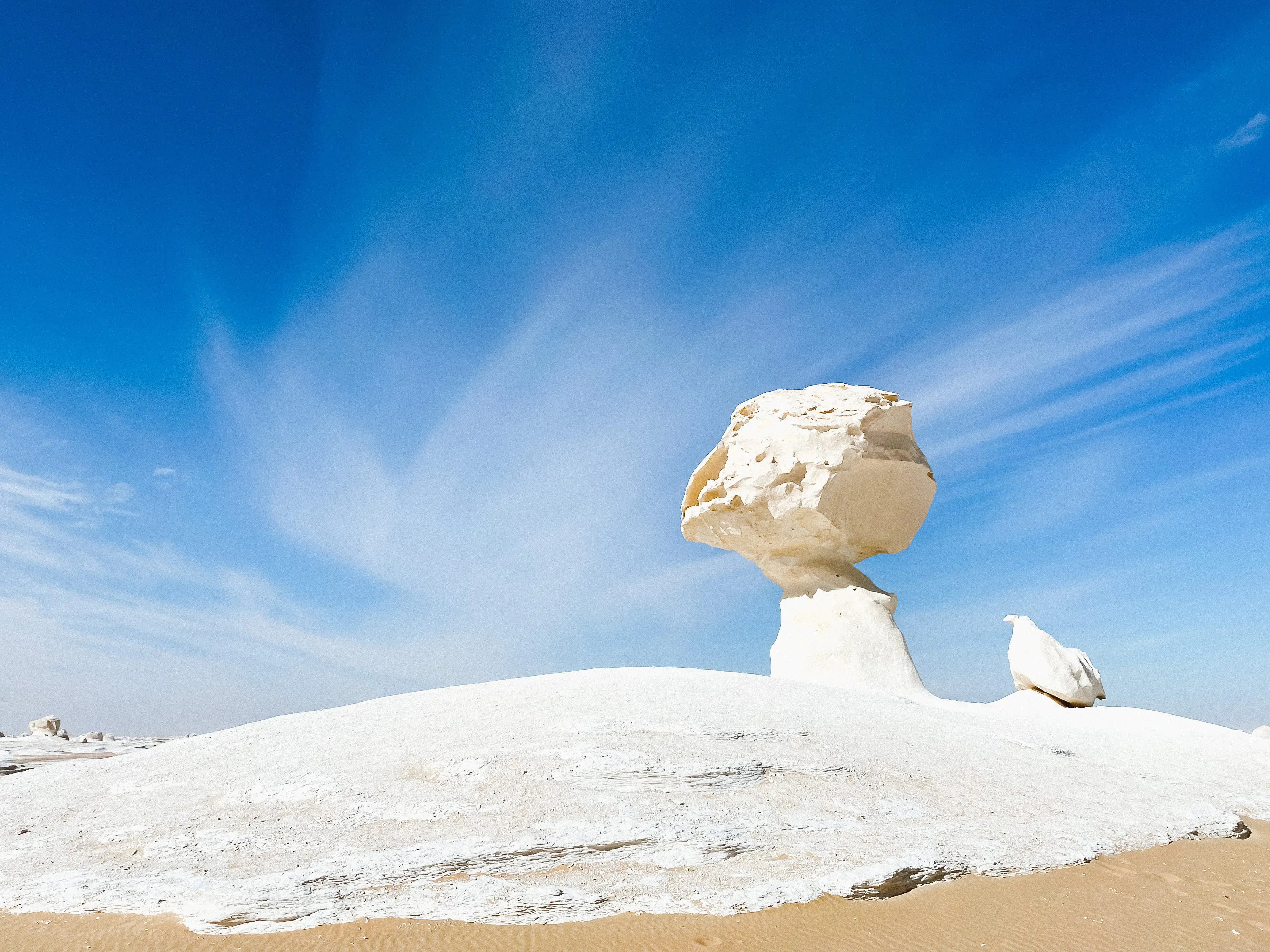 Sand and rock formations in Egypt's White Desert.