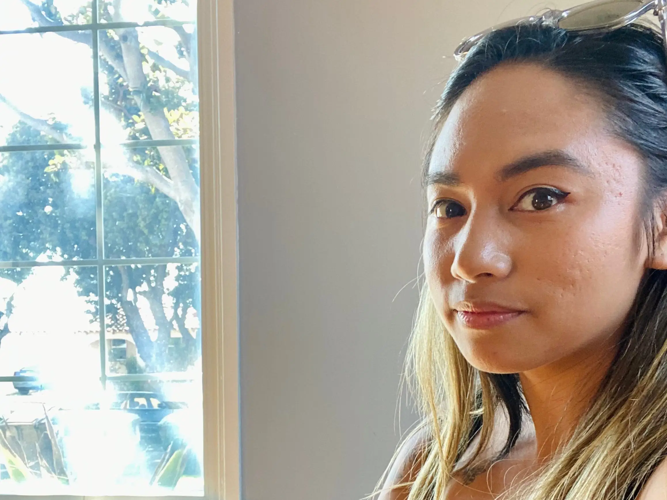 Woman taking selfie in empty home