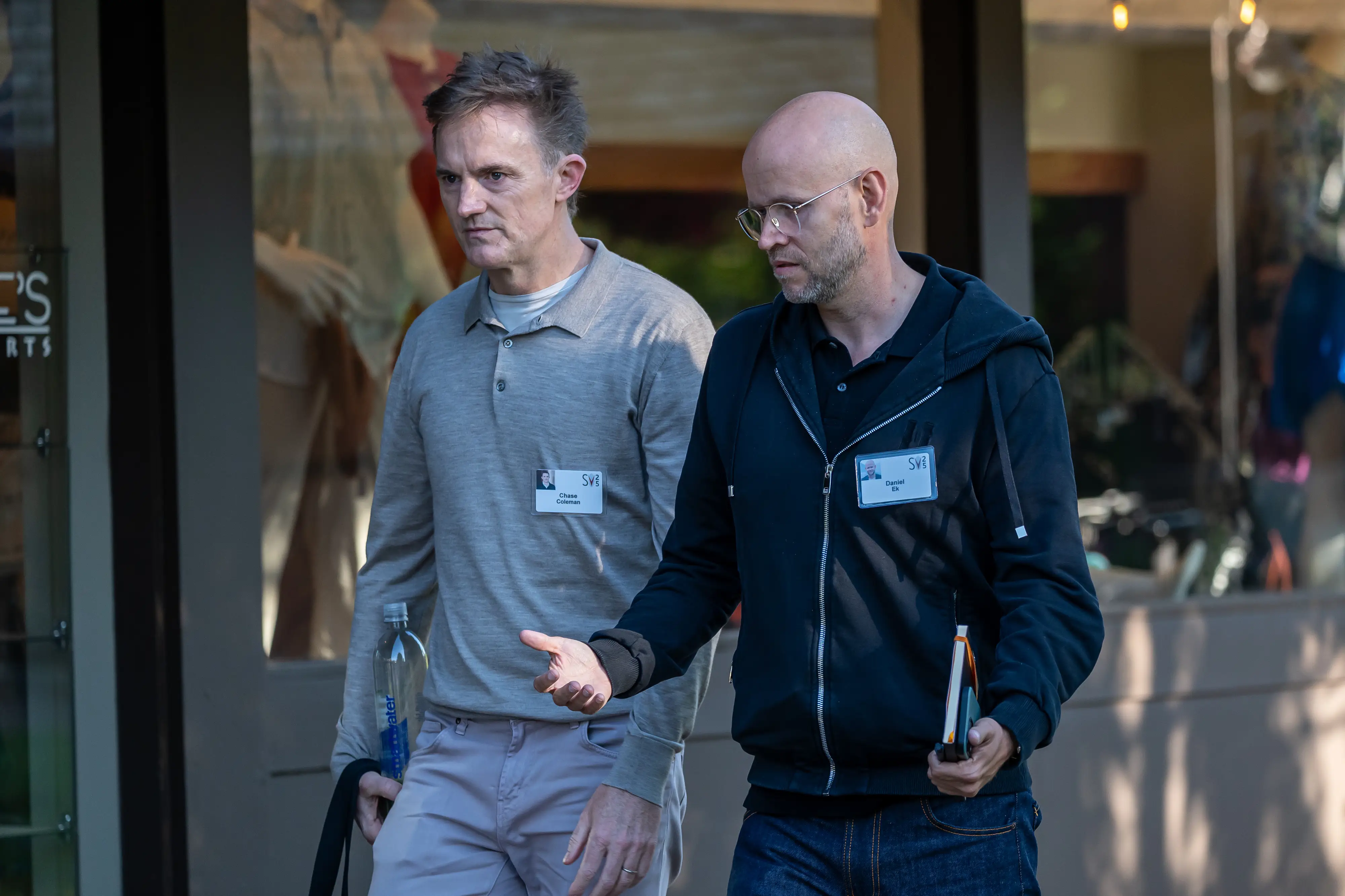 Chase Coleman walks with Spotify founder Daniel Ek