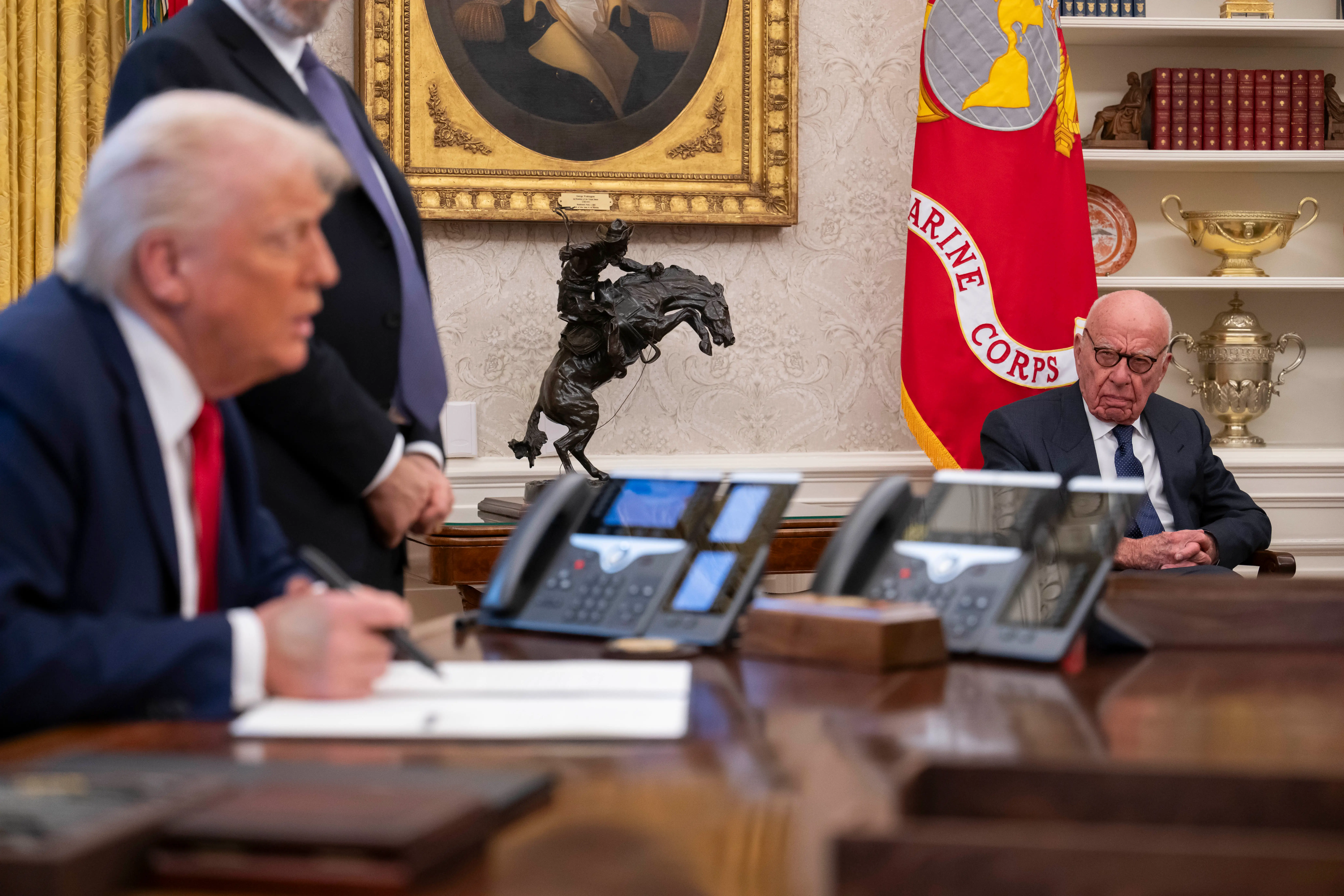 Rupert Murdoch looks at President Donald Trump during an event at the Oval Office at the White House in Washington, DC on February 03, 2025.