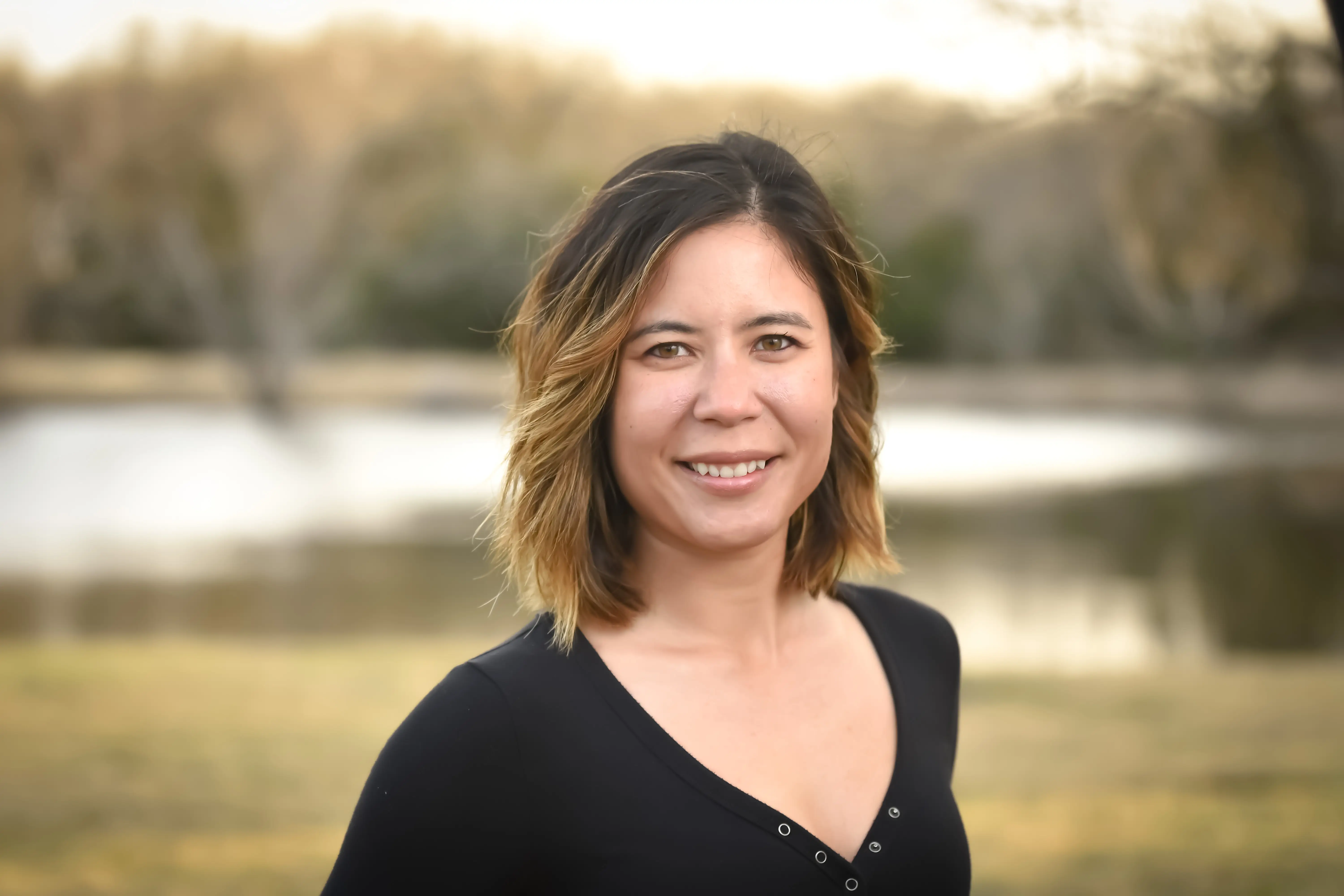 head shot of a woman outdoors