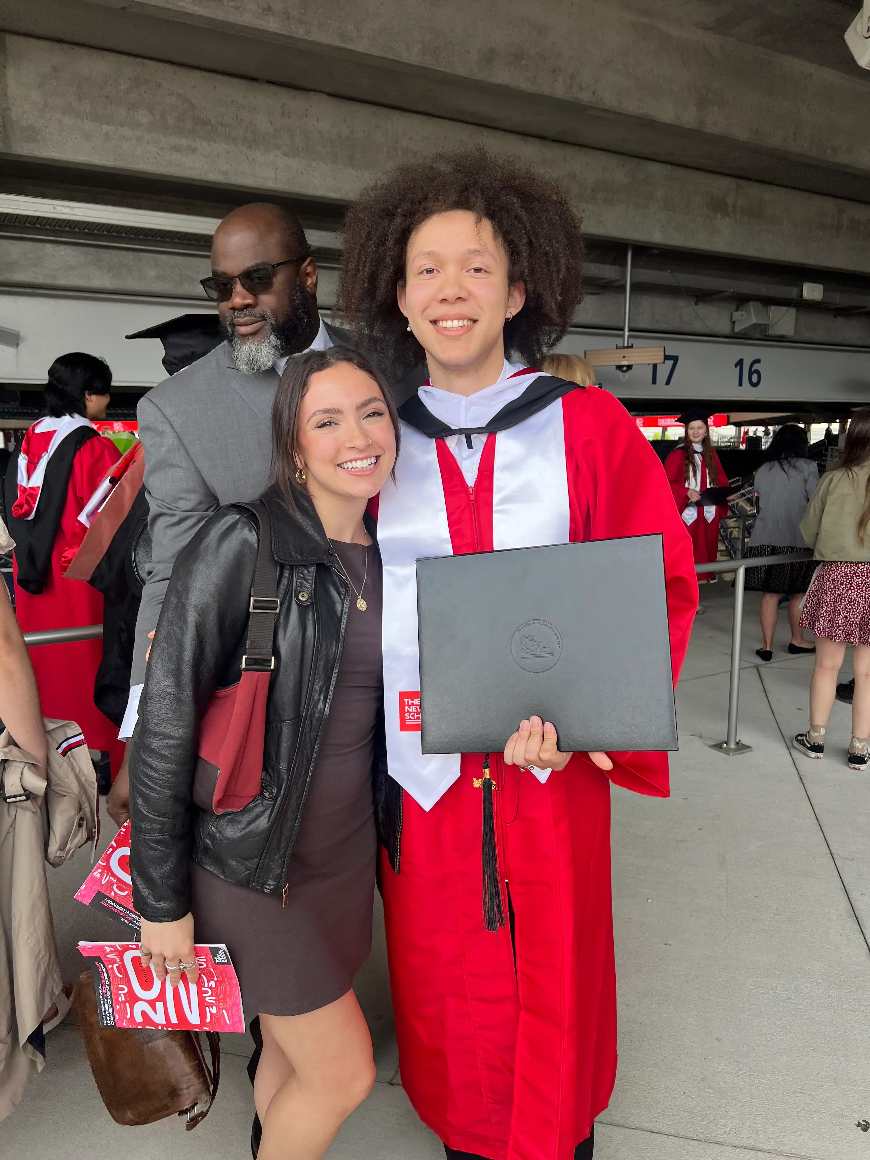 Moses Jeanfrancois in his college graduation gown