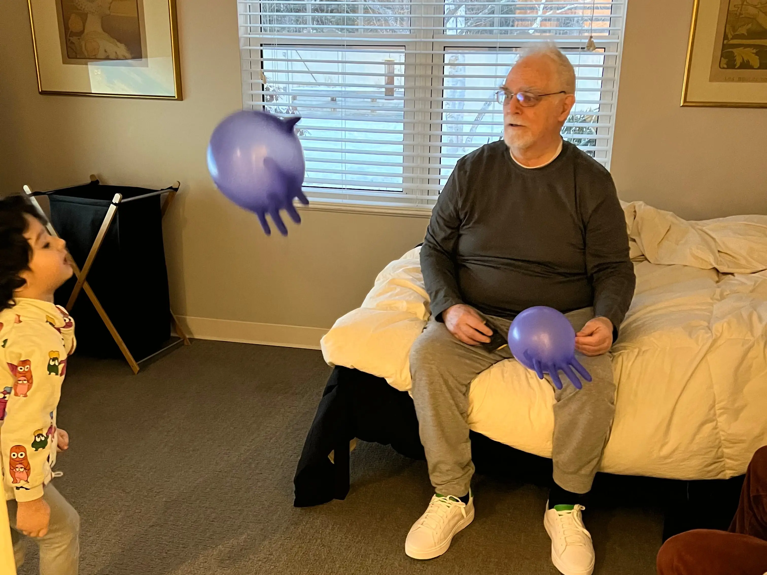Grandfather playing with child