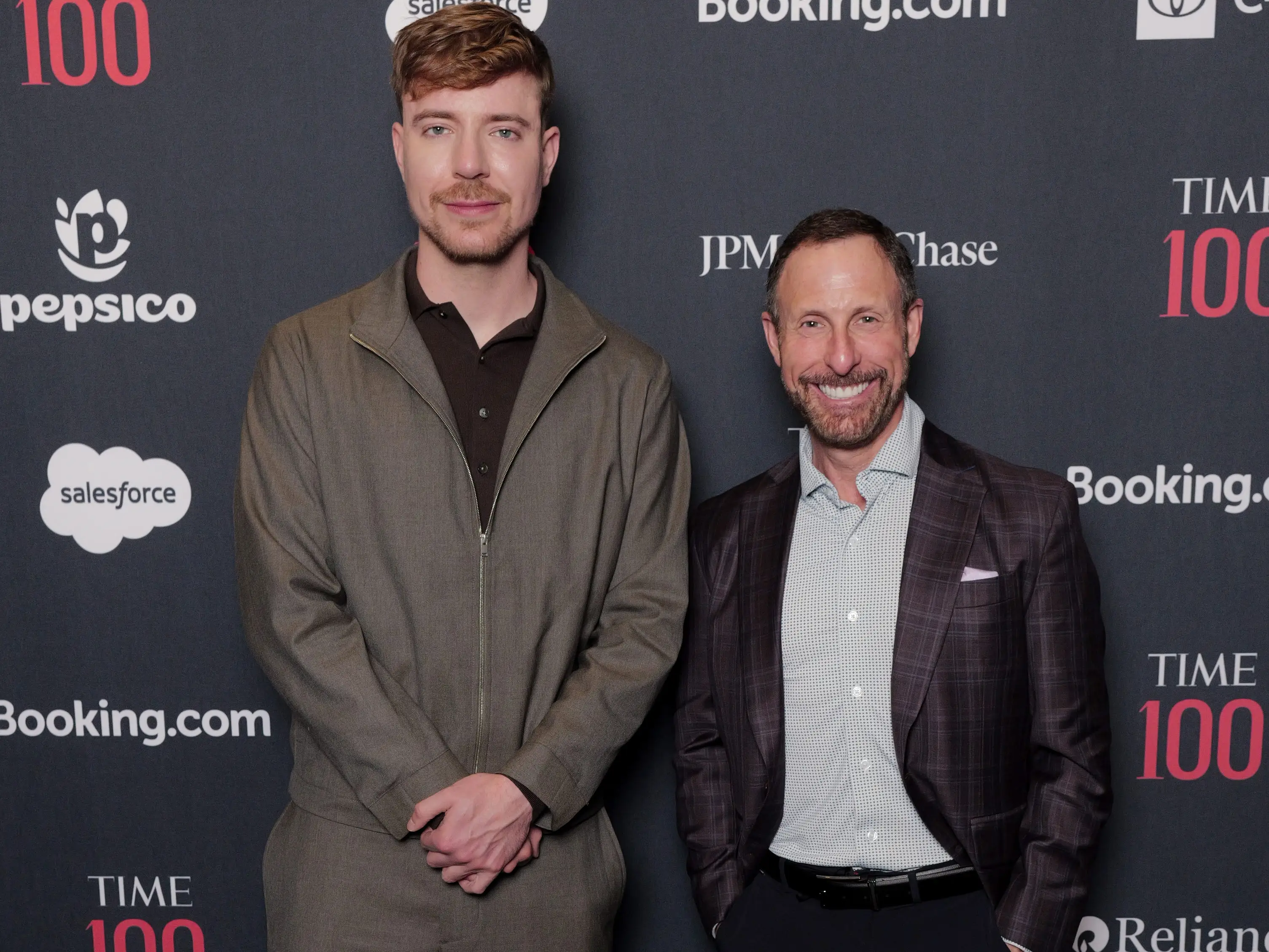 NEW YORK, NEW YORK - APRIL 22: (L-R) Jimmy Donaldson, aka MrBeast and Jeff Housenbold attend the 2026 TIME100 Summit at Jazz at Lincoln Center on April 22, 2026 in New York City. (Photo by Craig Barritt/Getty Images for TIME)