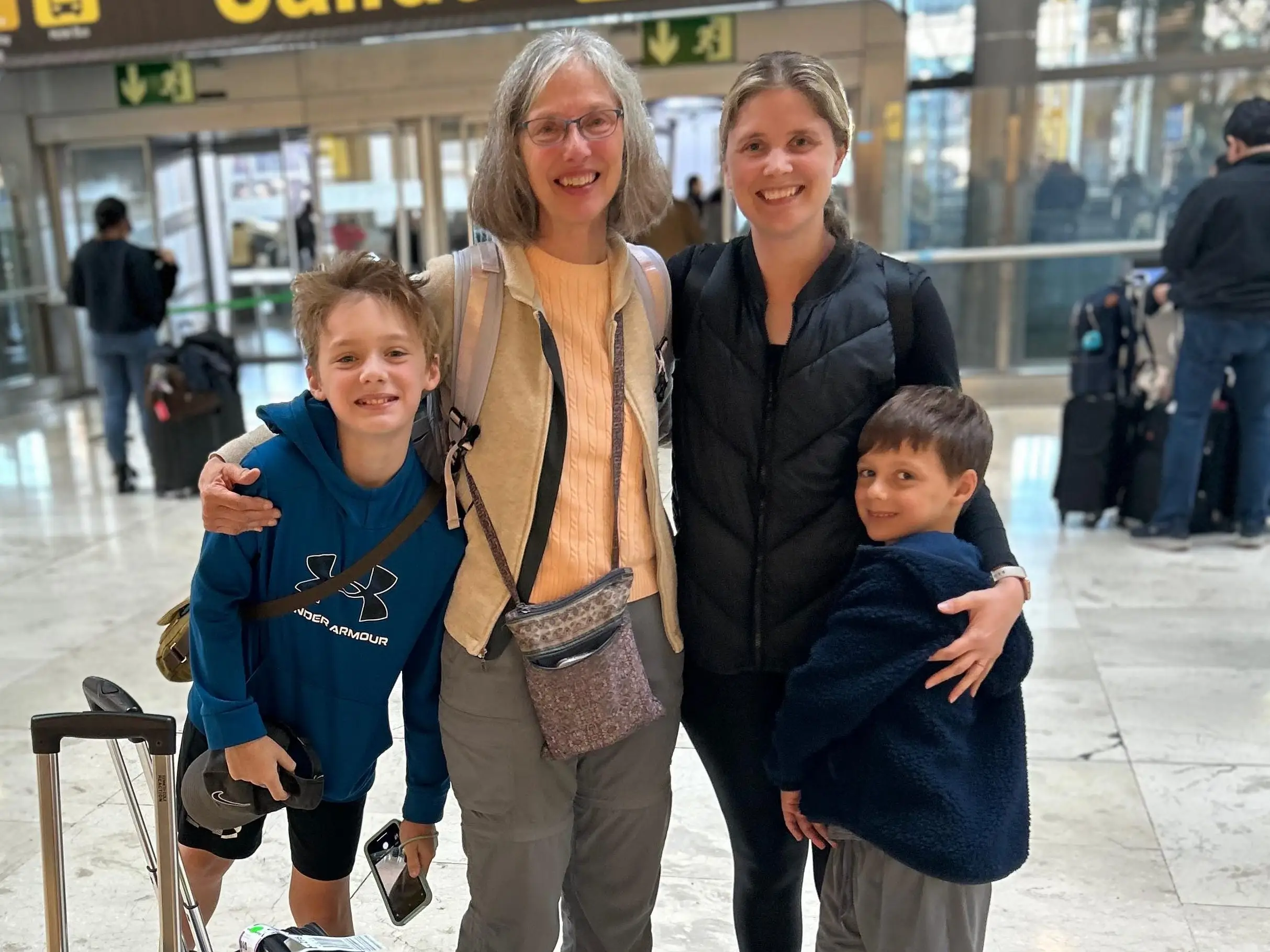 Rebecca Cretella's mother and sons at the airport