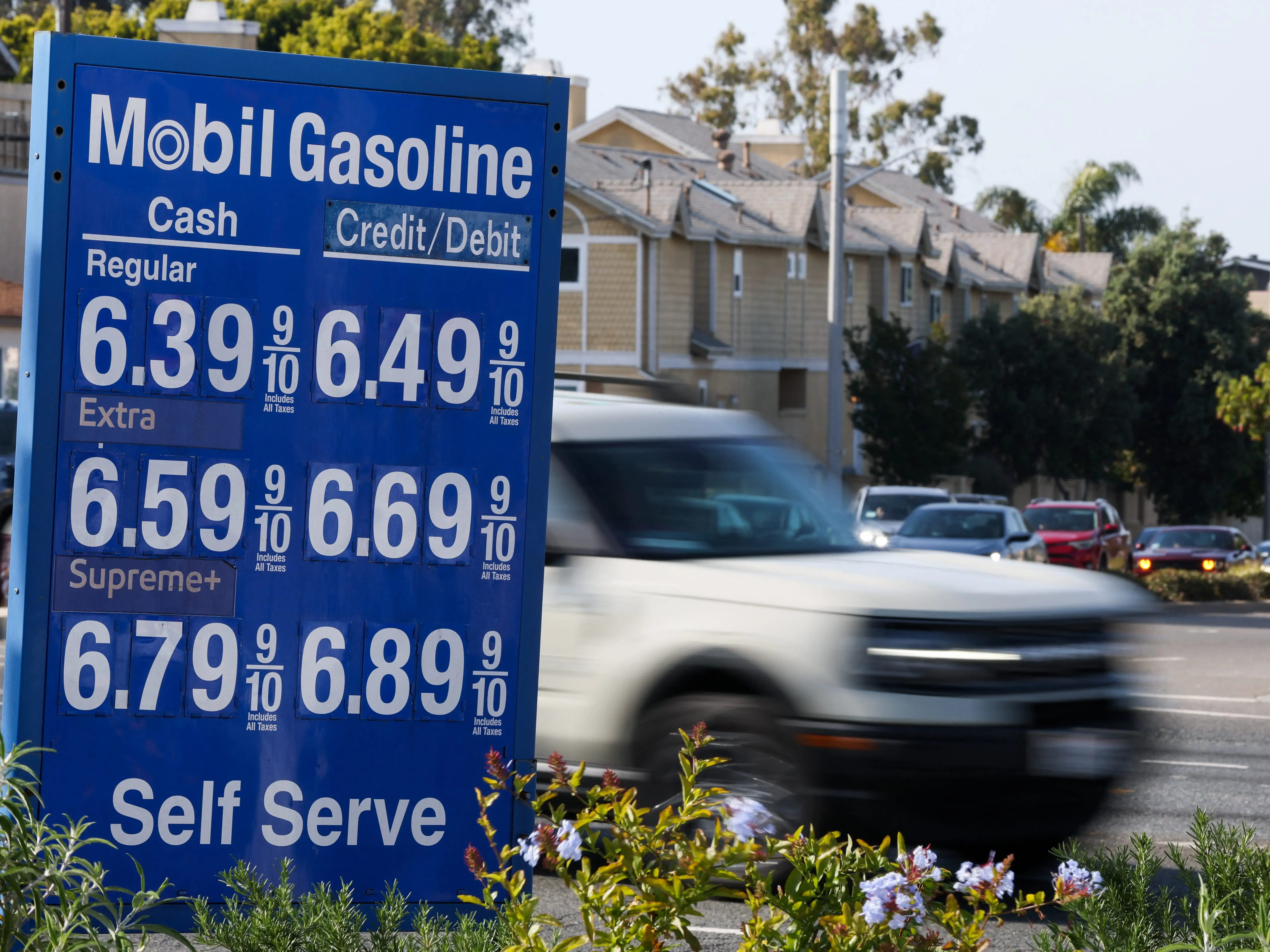 Sign of prices at a Mobil gas station