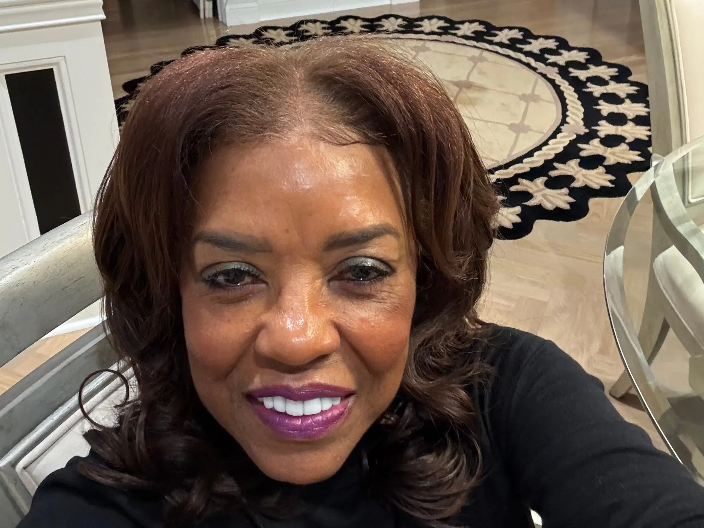 A woman taking a selfie.