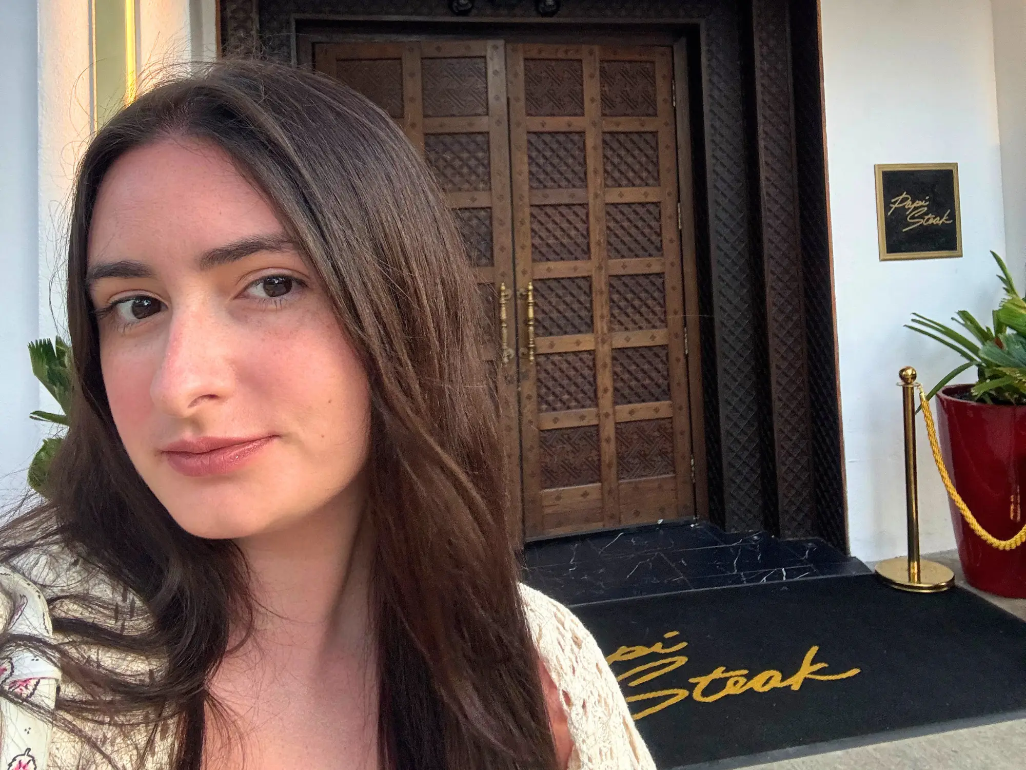 author outside papi steak