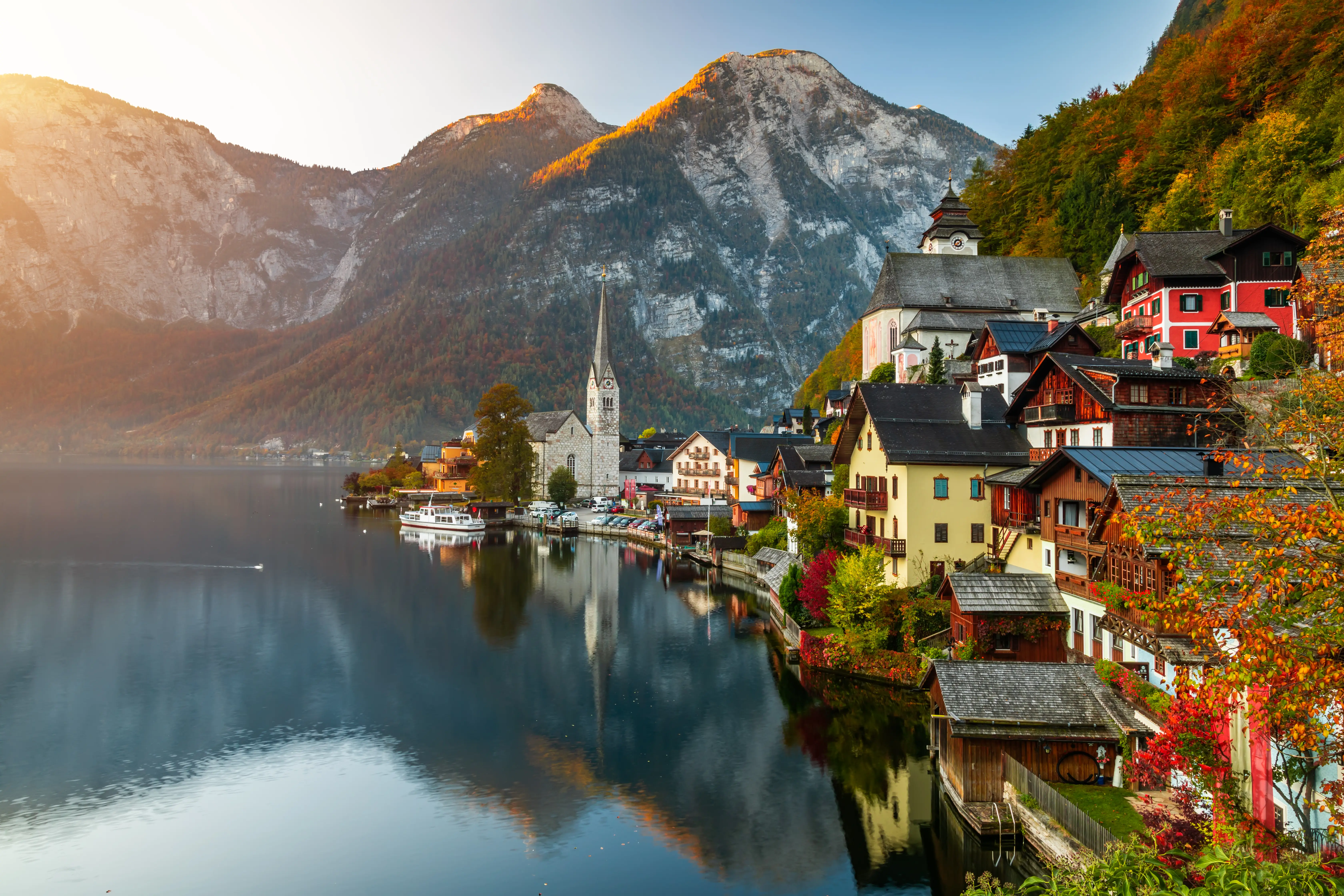 A view of Hallstatter Lake in Austria with surrounding homes.