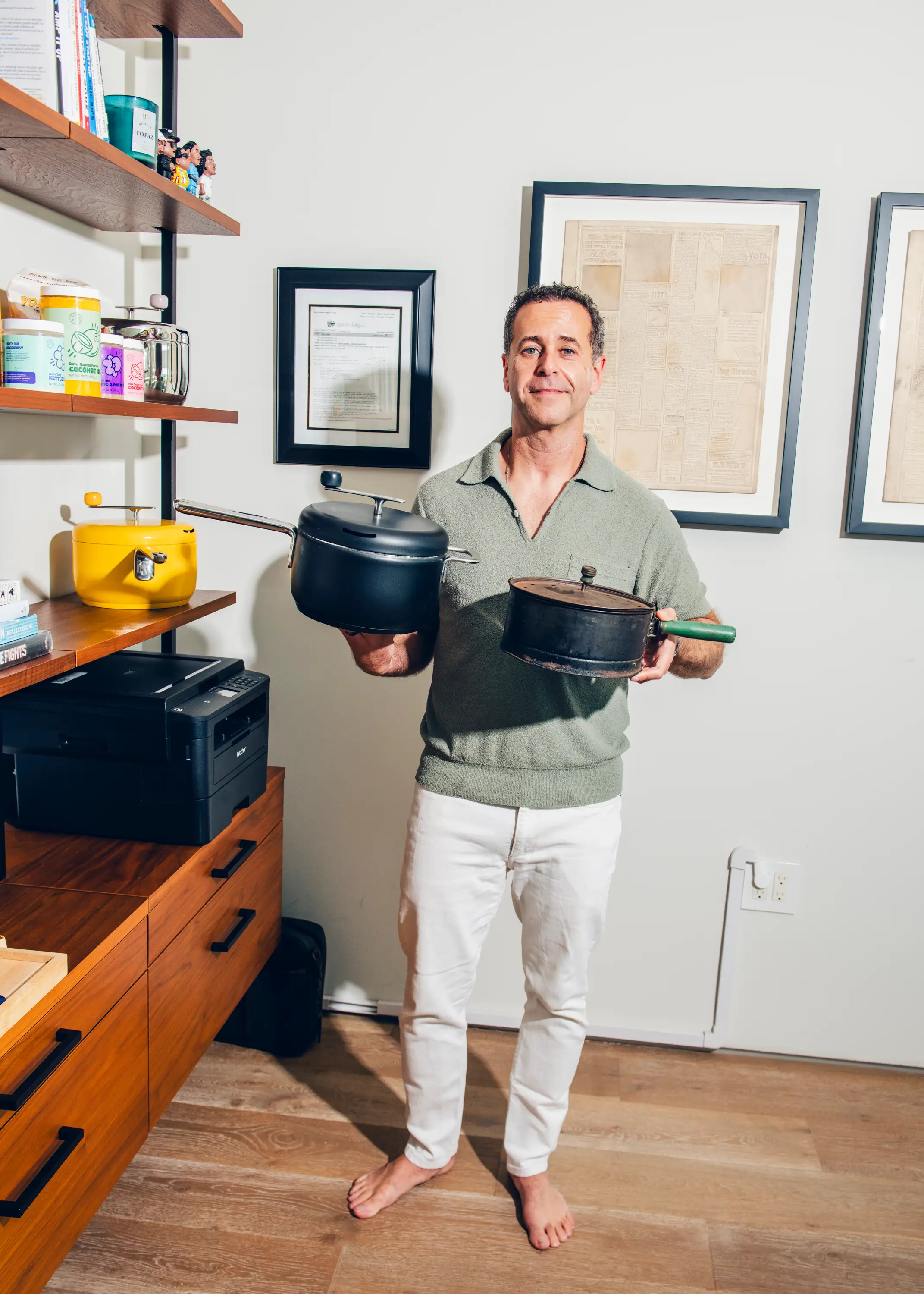 Tal Moore, CEO of Popsmith, holds up a vintage popper.