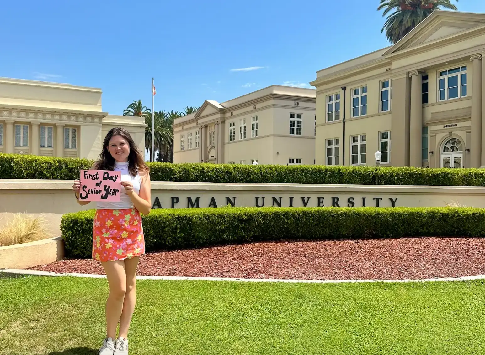 Lauren Trippeer in front of her unvierstiy campus