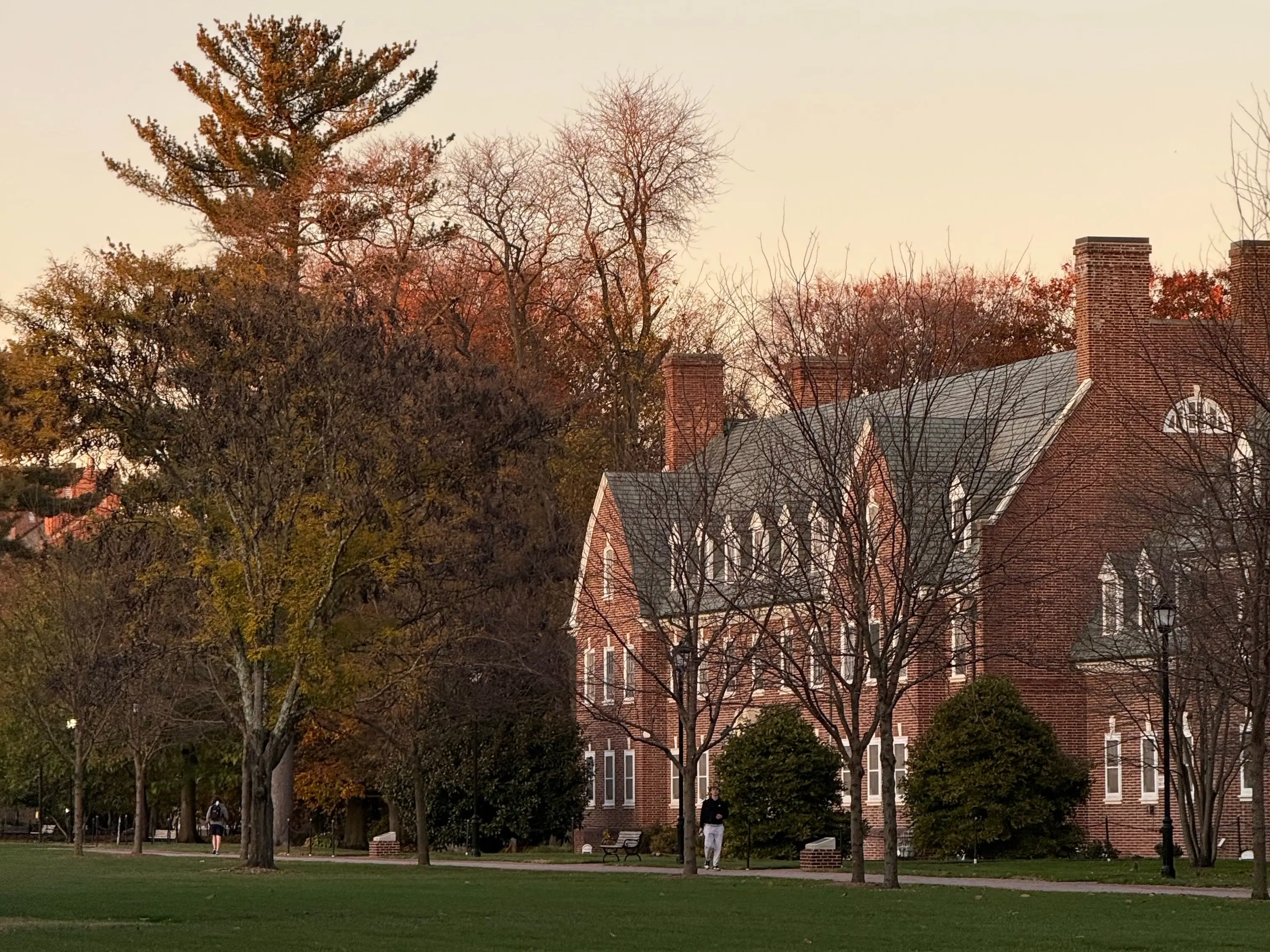 Beautiful sunset at the university of Delaware, old architecture and fall foliage