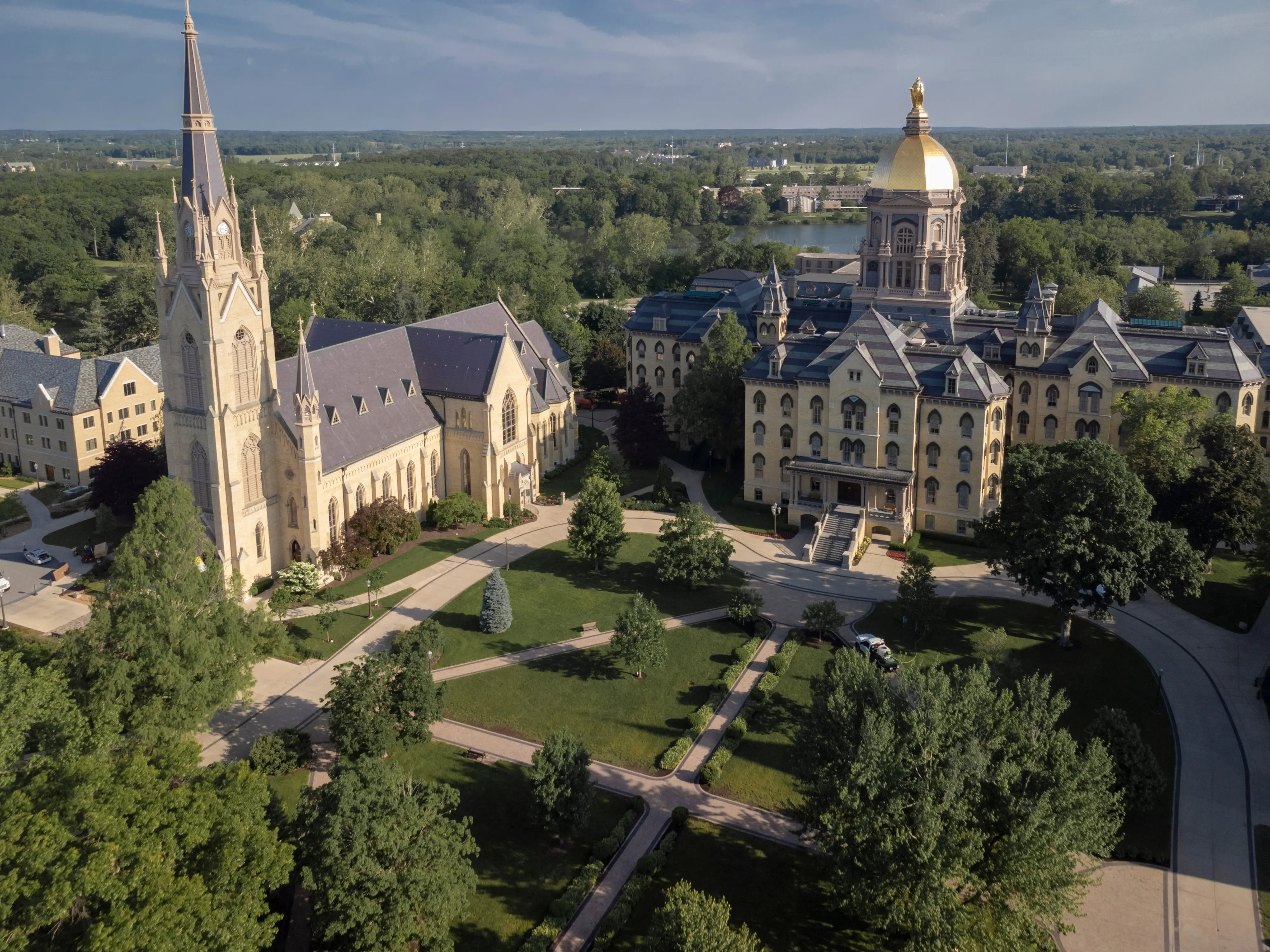 South Bend, Indiana - May 25, 2022: Basilica of the Sacred Heart and Main Building at the University of Notre Dame college campus