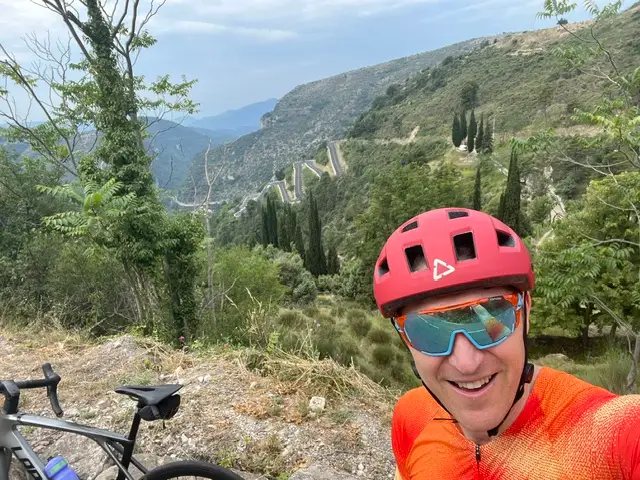 Dr. Jake Kelly biking outside