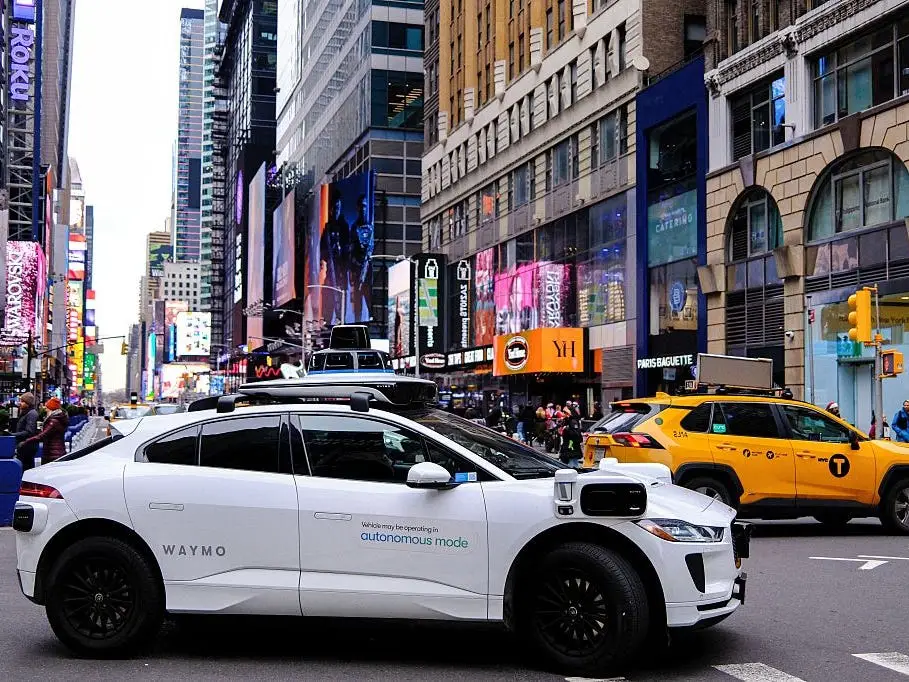 A Waymo driving through Manhattan.