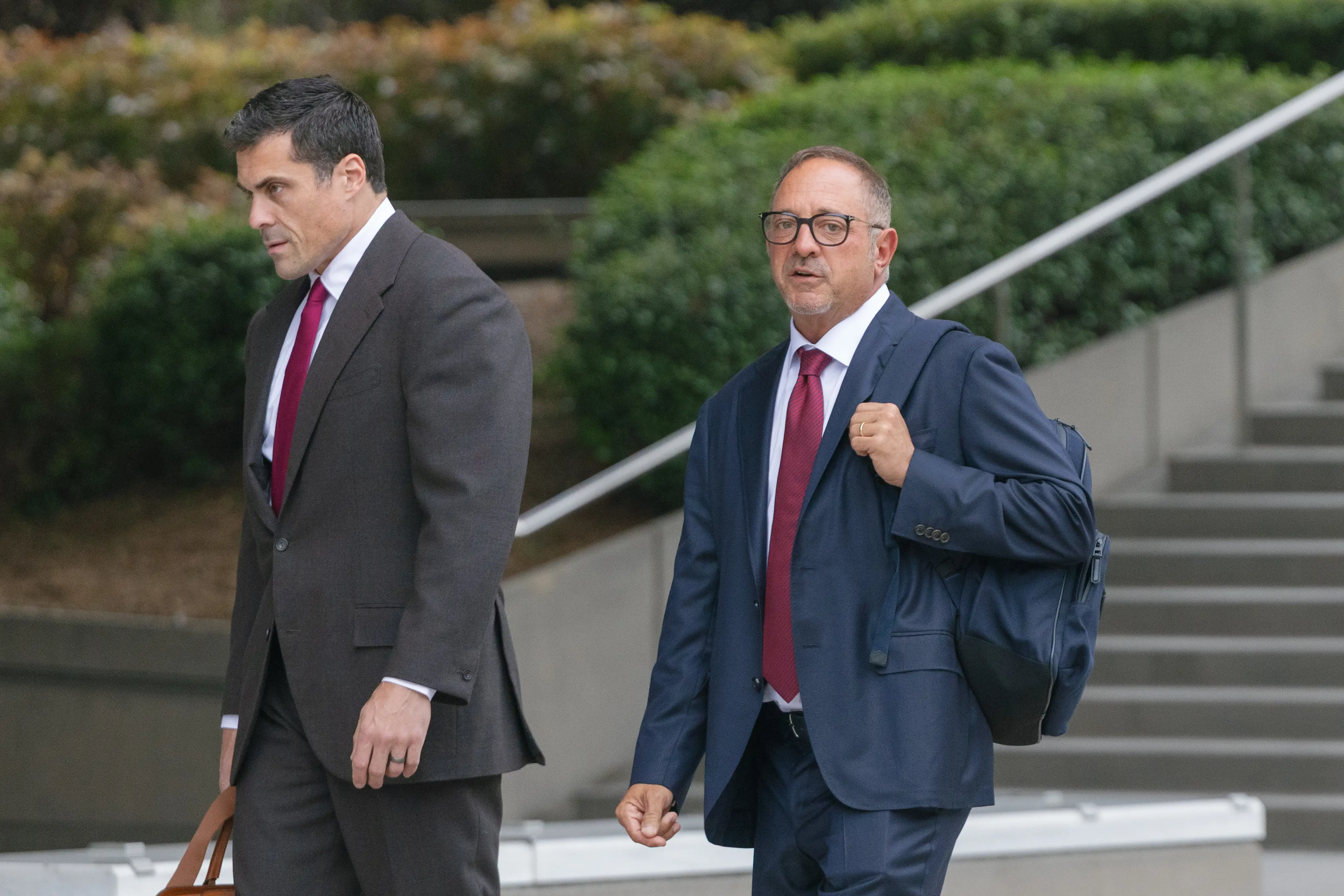 Andrew Left with his lawyer.