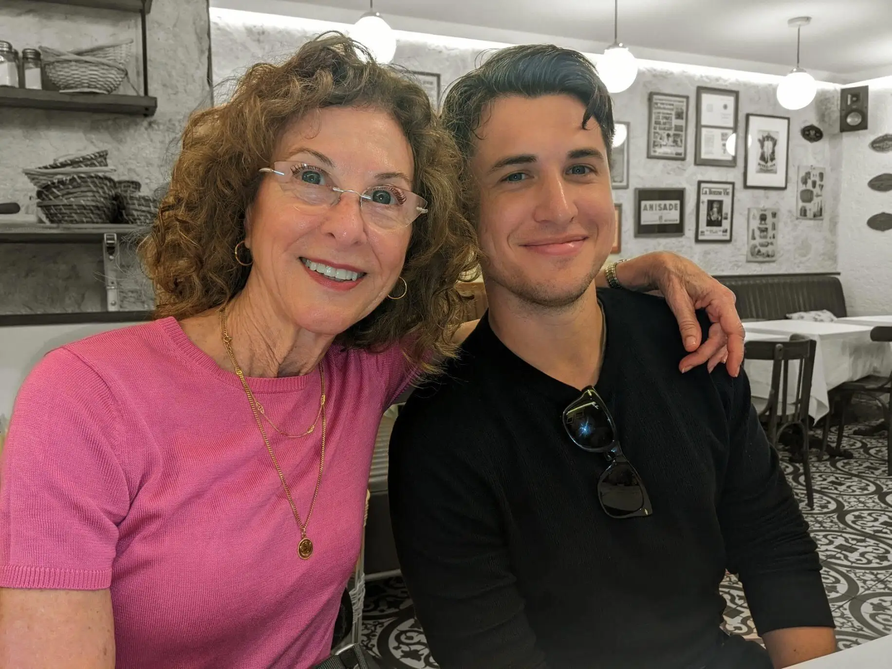 Mom and son posing for photo