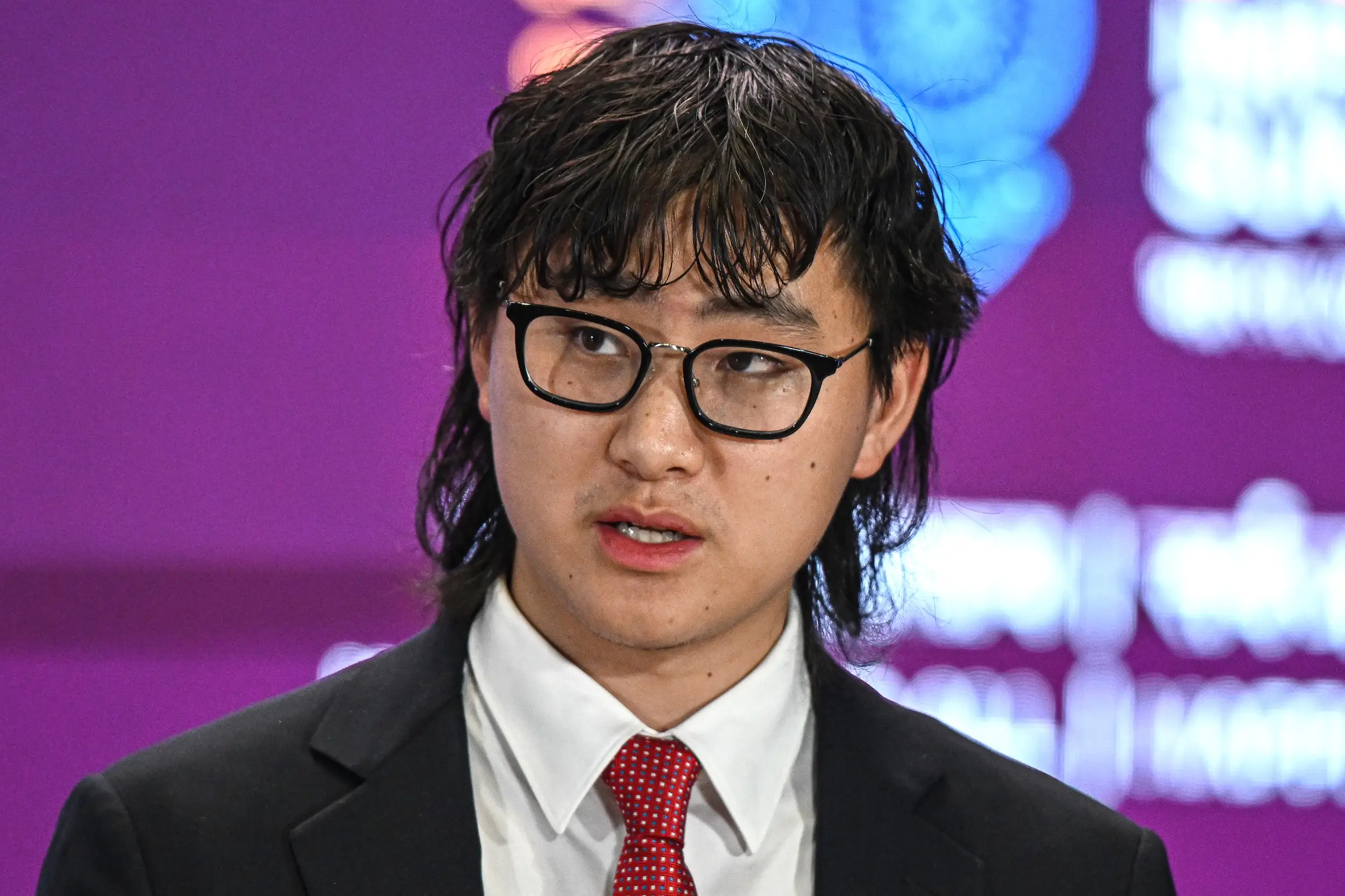Alexandr Wang speaks during a conference