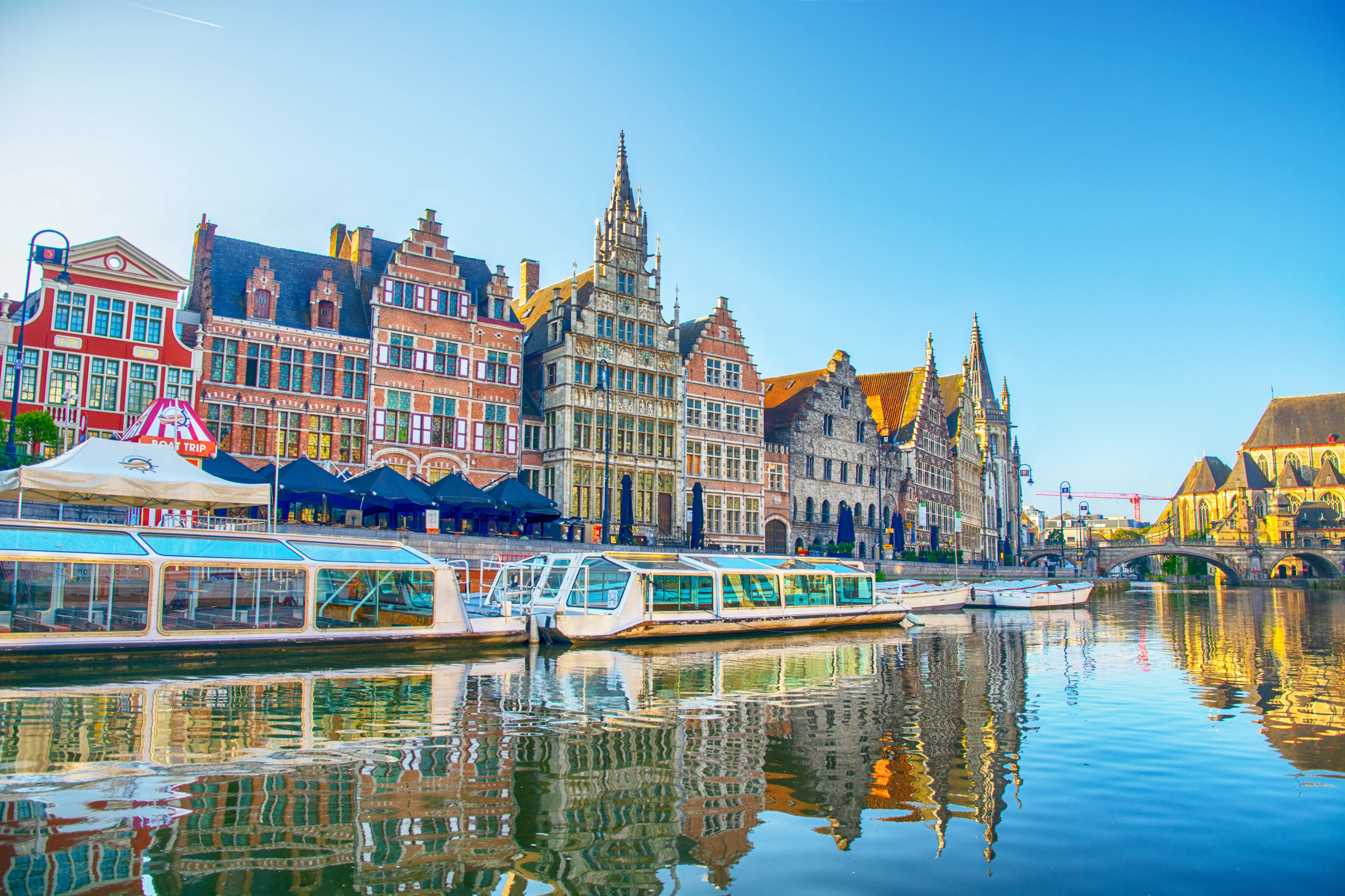 Graslei quay on the right bank of the Leie river in the historic city center of Ghent, Belgium.