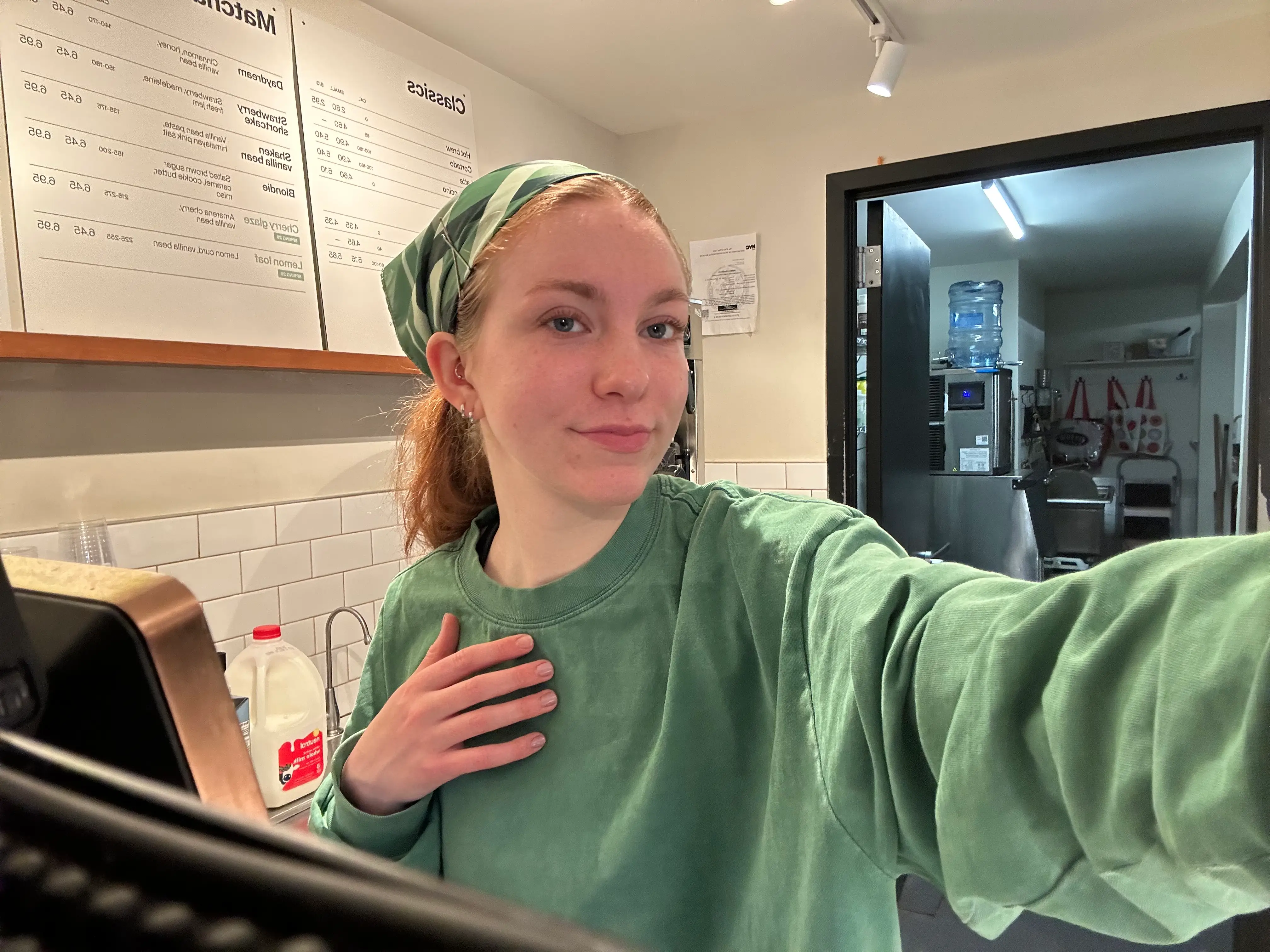 Joanna Insco behind the counter at coffee shop