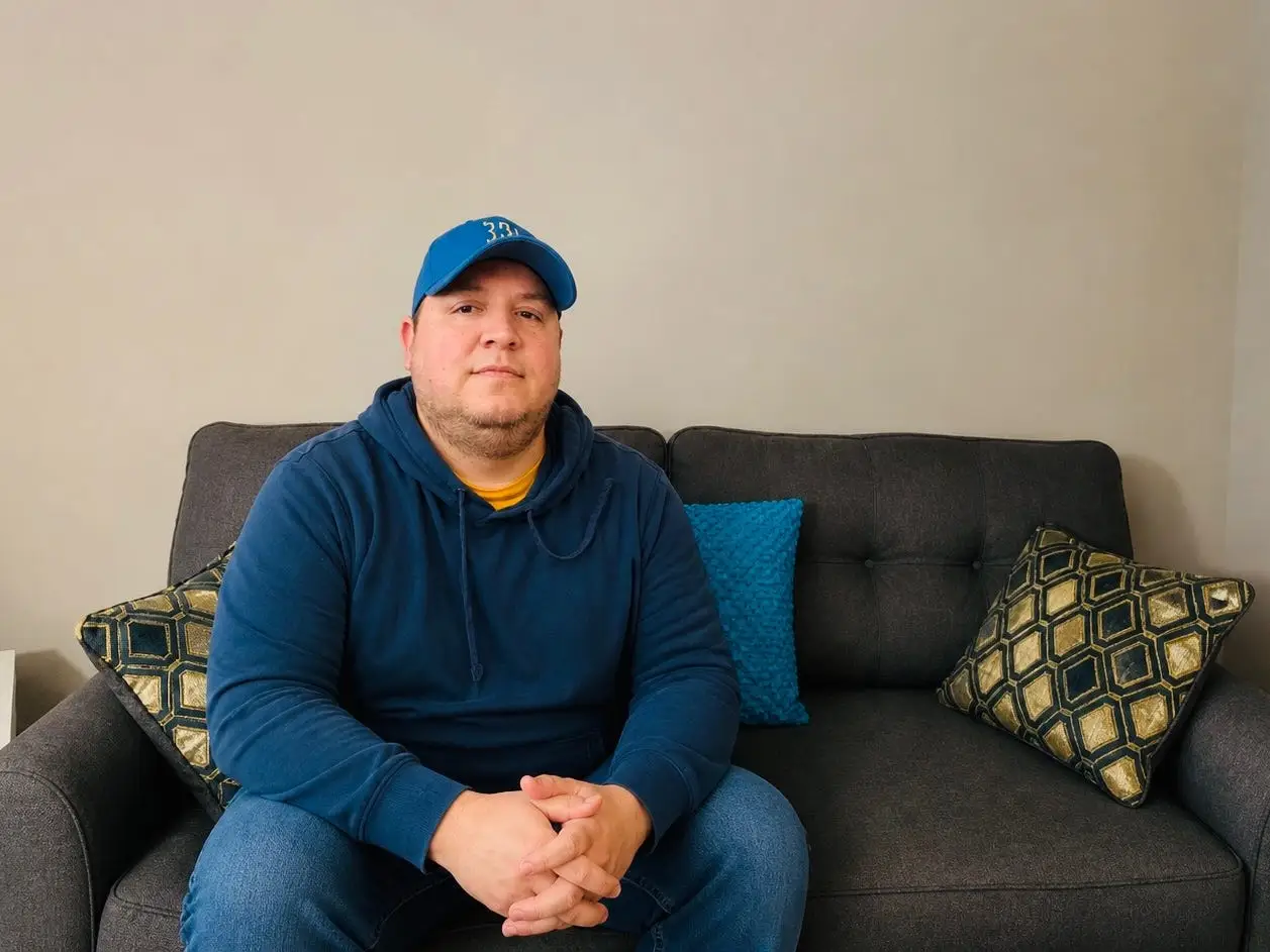 Man sitting on a couch