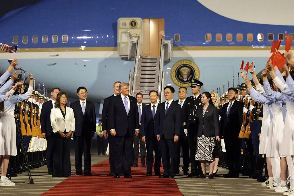 President Donald Trump disembarked from Air Force One for a ceremonial welcome in Beijing on Wednesday.