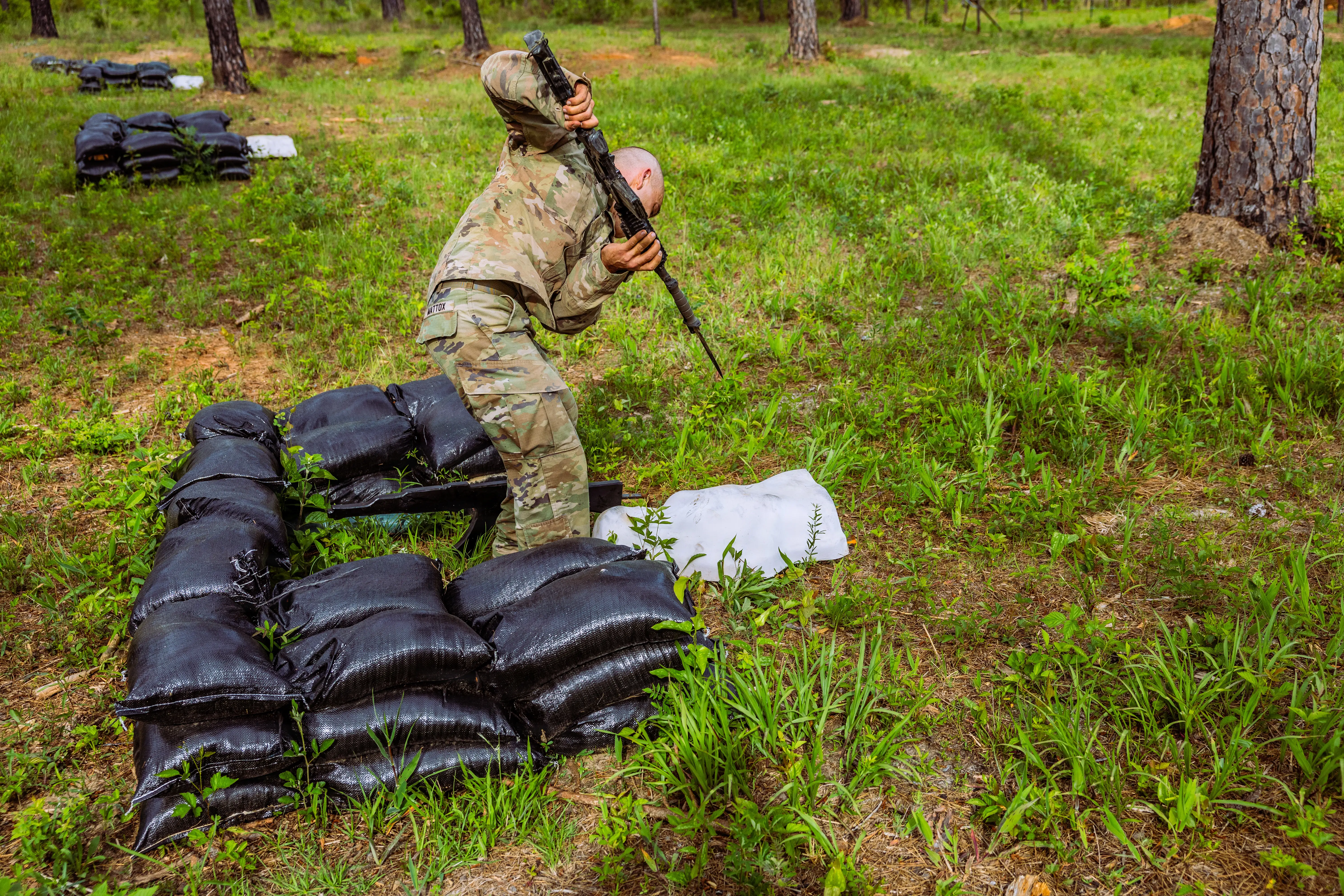 A U.S. Army Ranger Course student from Class 06-26 attacks a prone enemy target on the new Bayonet Assault Course during the Ranger Assessment Phase (RAP) April 21, 2026, at Fort Benning, Georgia.
