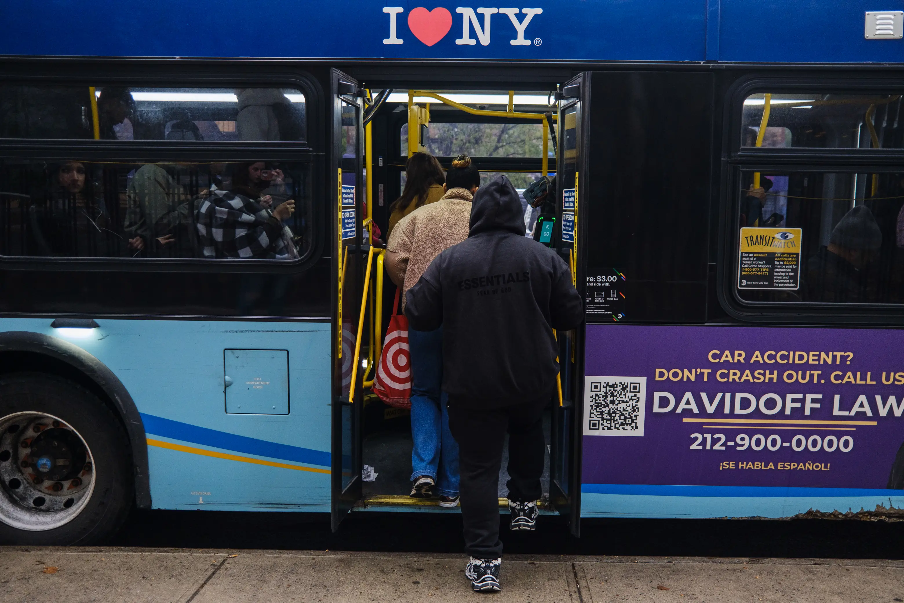 People boarding the M15 bus