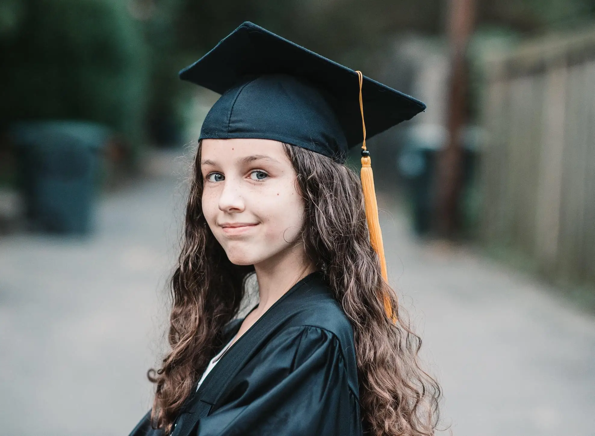 The author's daughter in a black cap and gown.