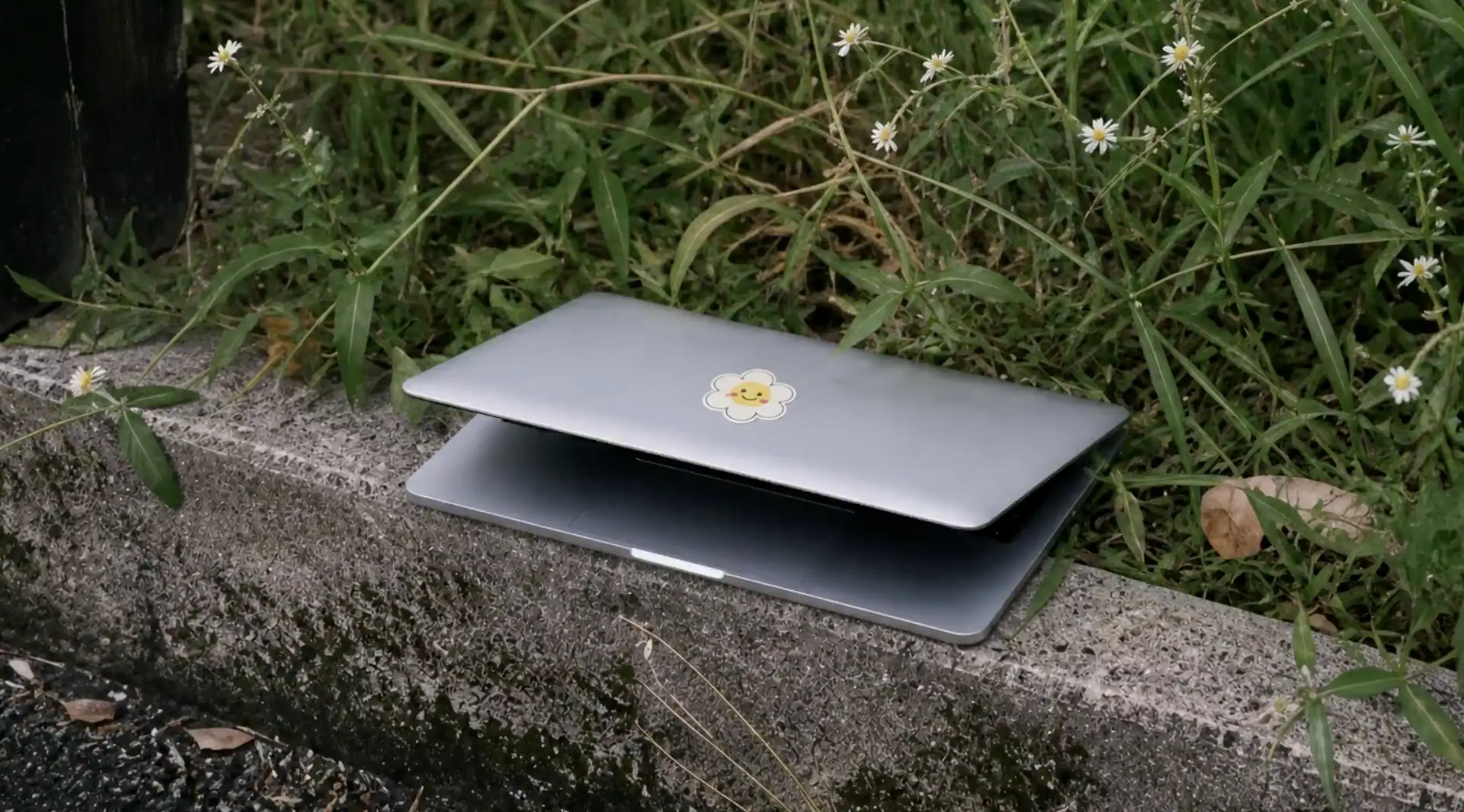A laptop is pictured cracked open.