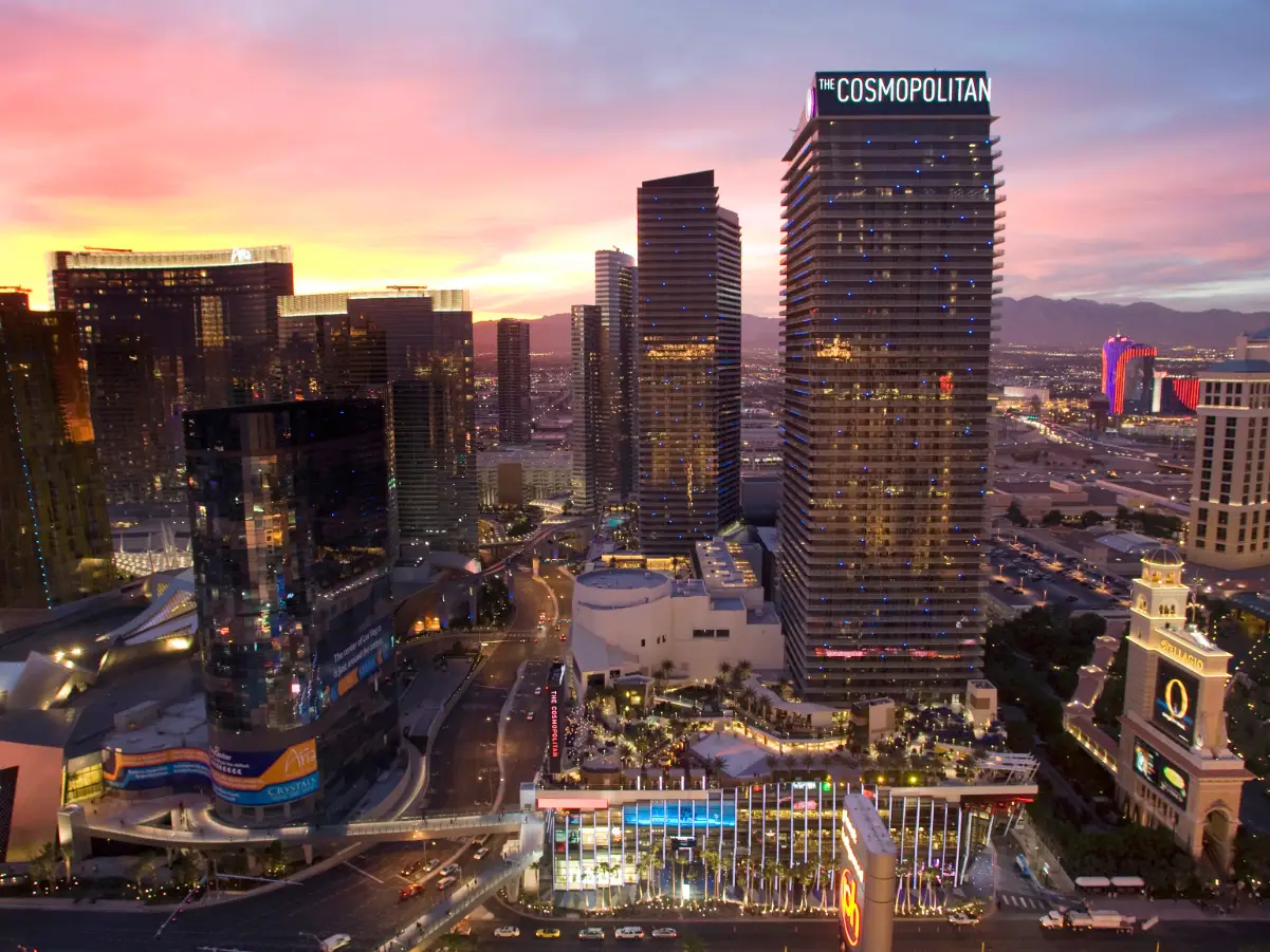 The Cosmopolitan, a tall dark building at sunset on the las Vegas Strip