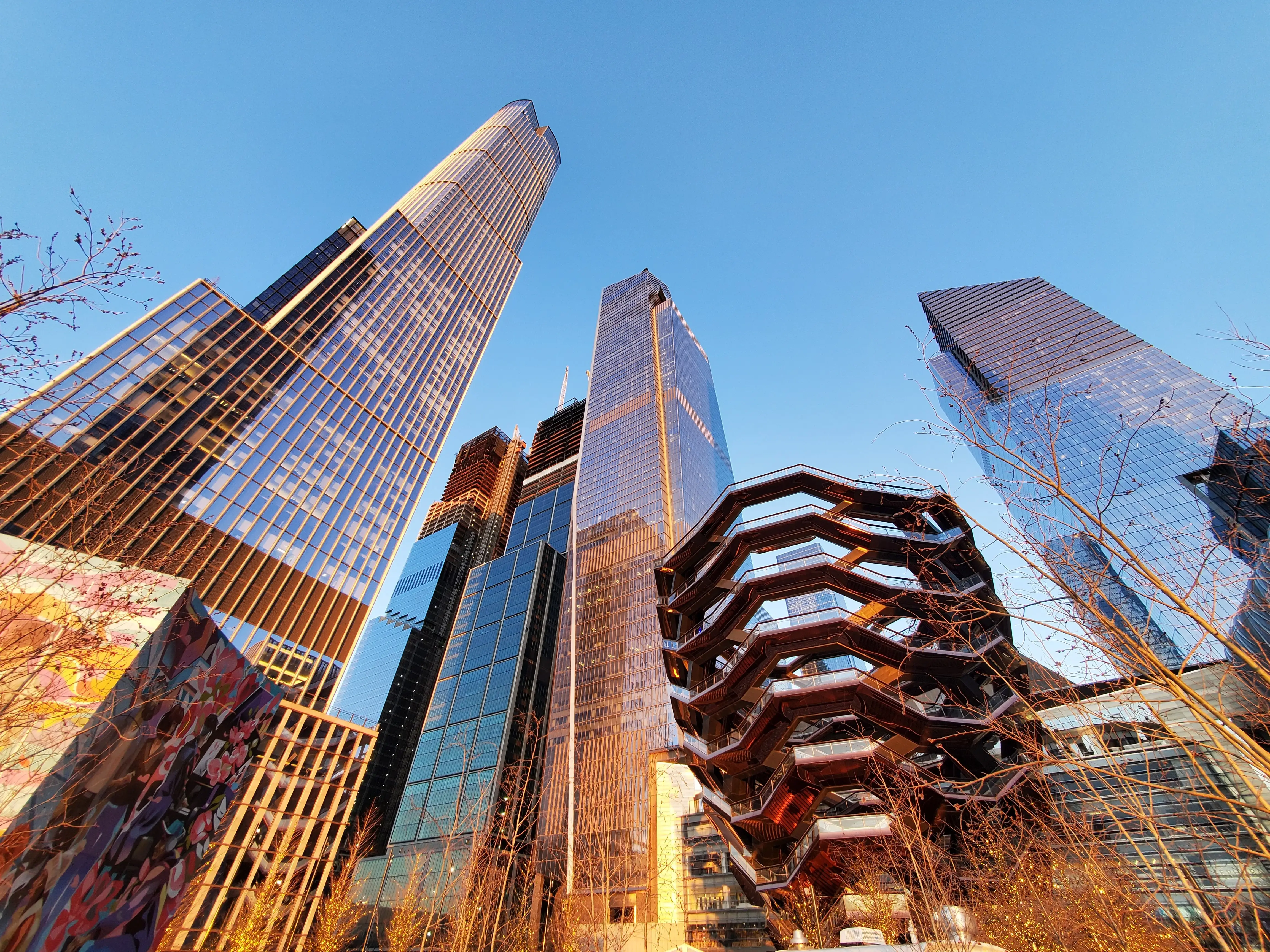 Stunning sunset photograph of the iconic Hudson Yards skyscrapers including The Vessel, located in Manhattan, New York