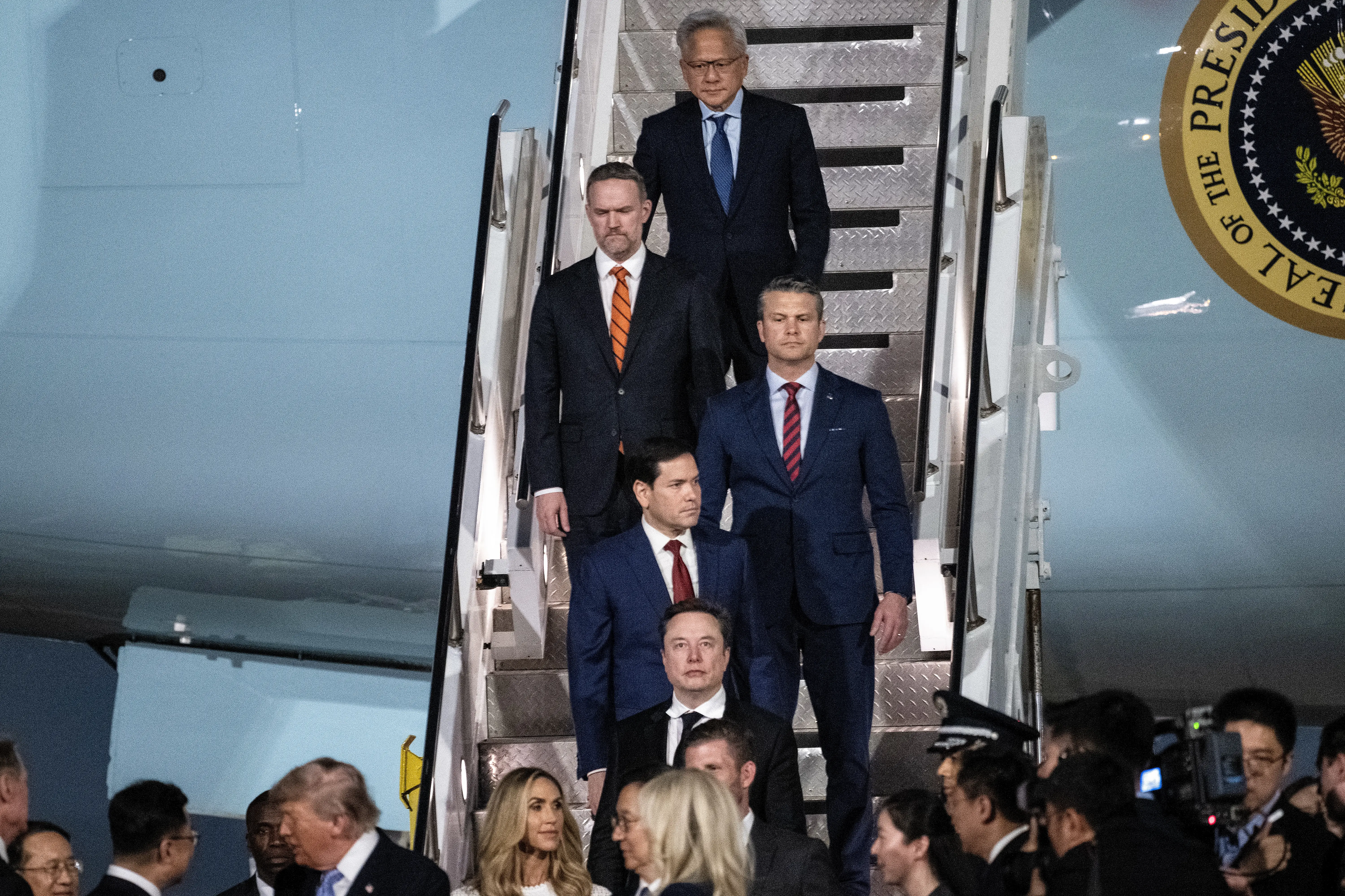 Jensen Huang steps off Air Force One.