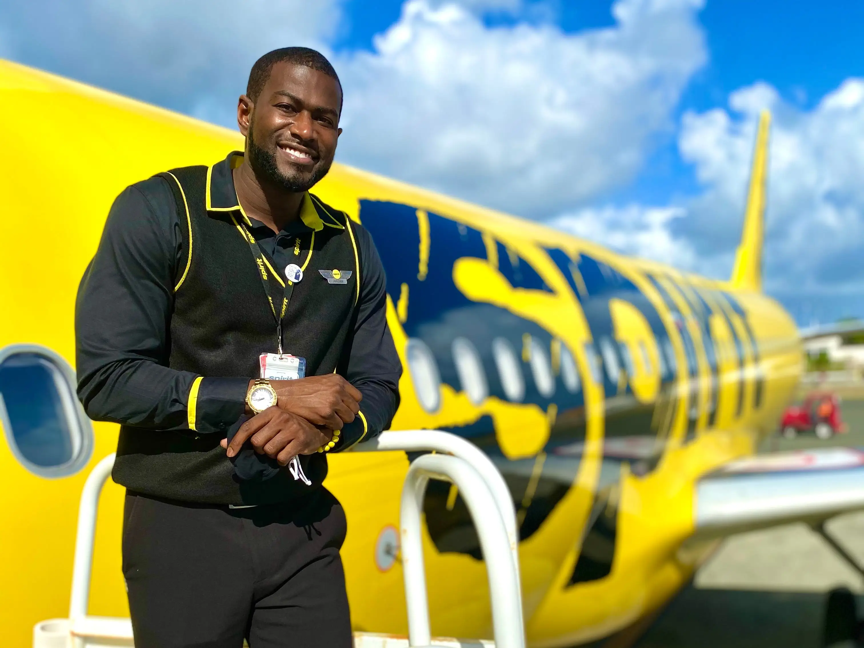 Julian Richardson in front of Spirit Airlines plane