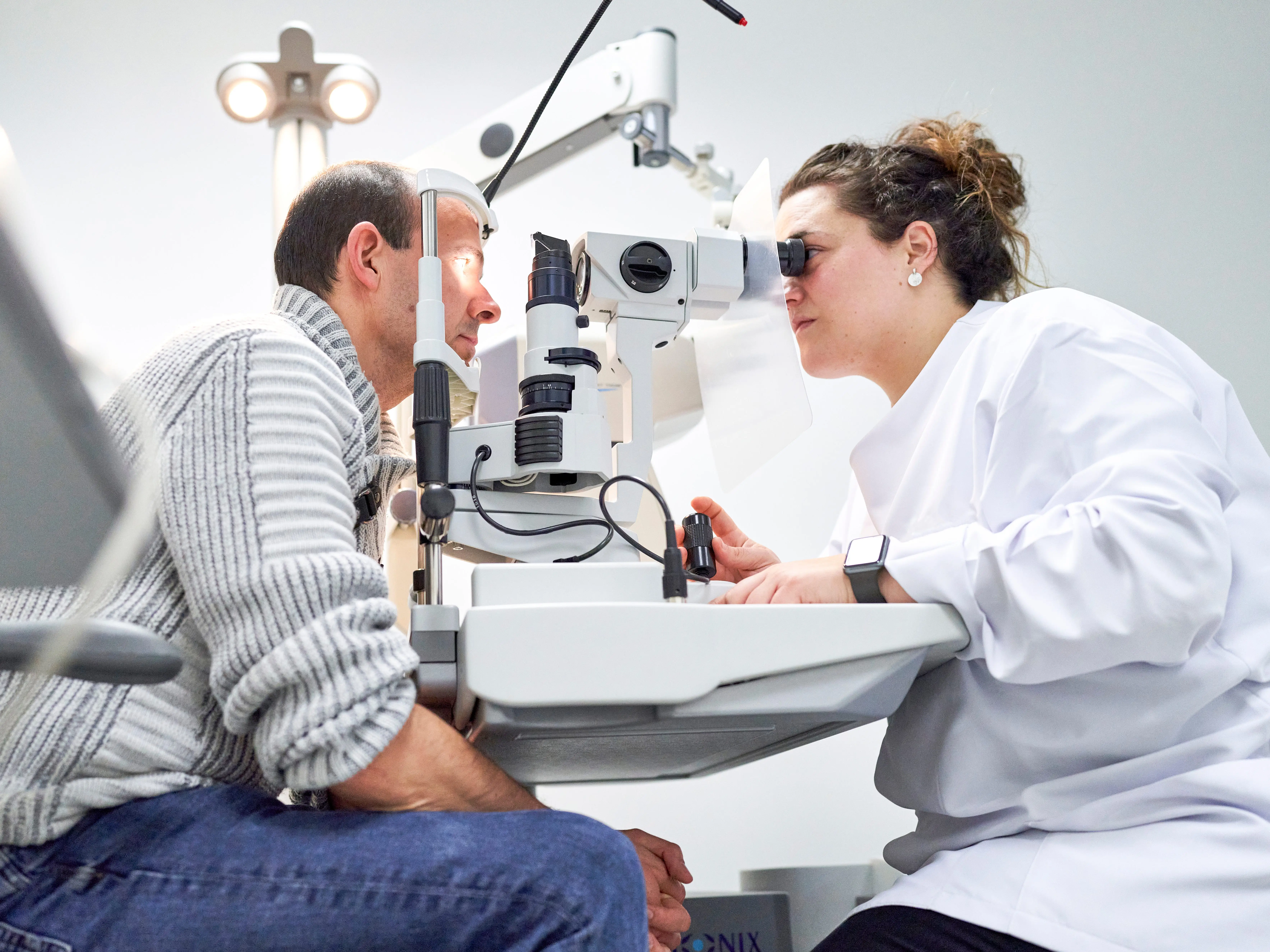 Ophthalmologist with a patient