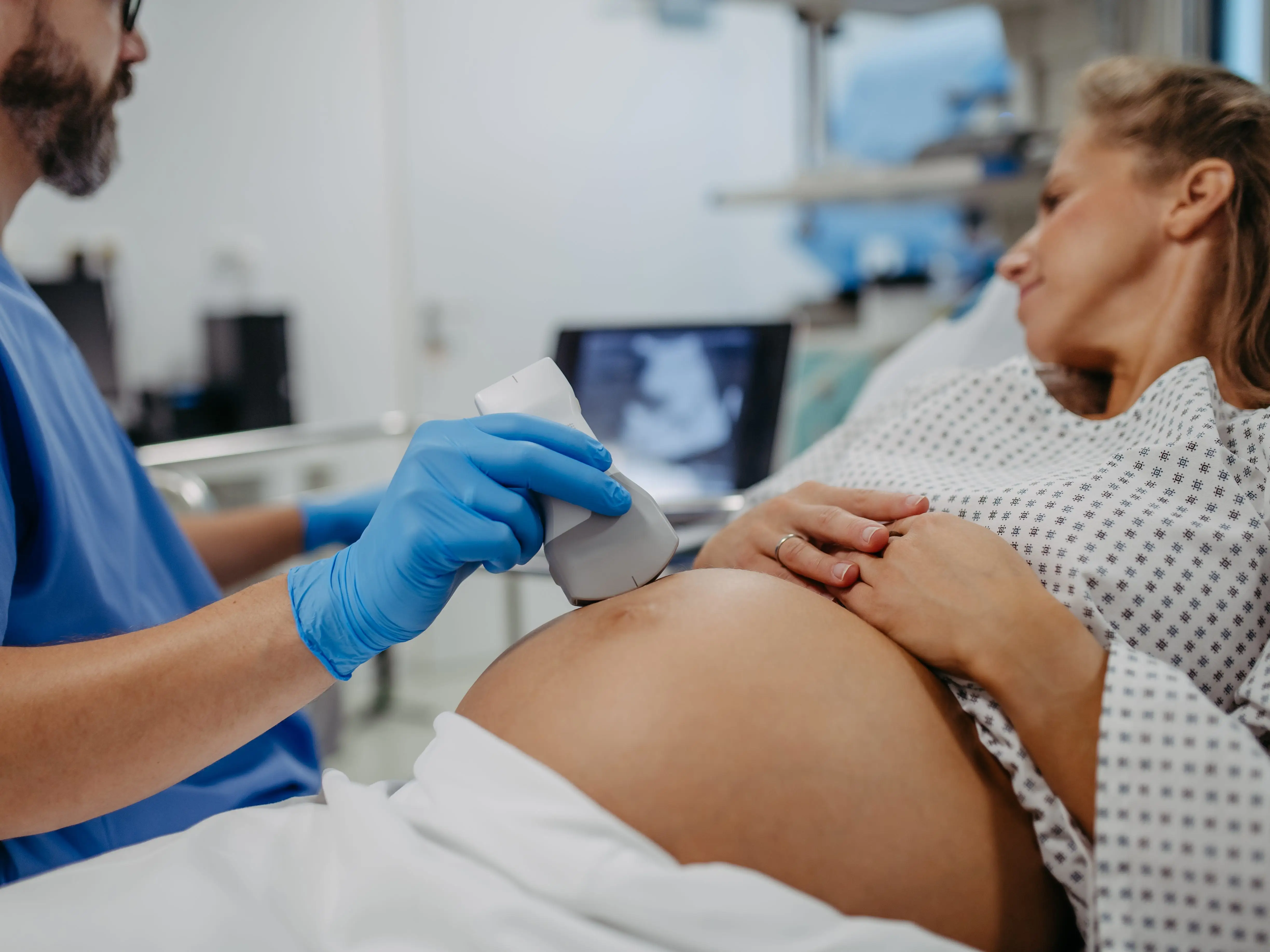 Obstetrician-gynecologist doing an ultrasound